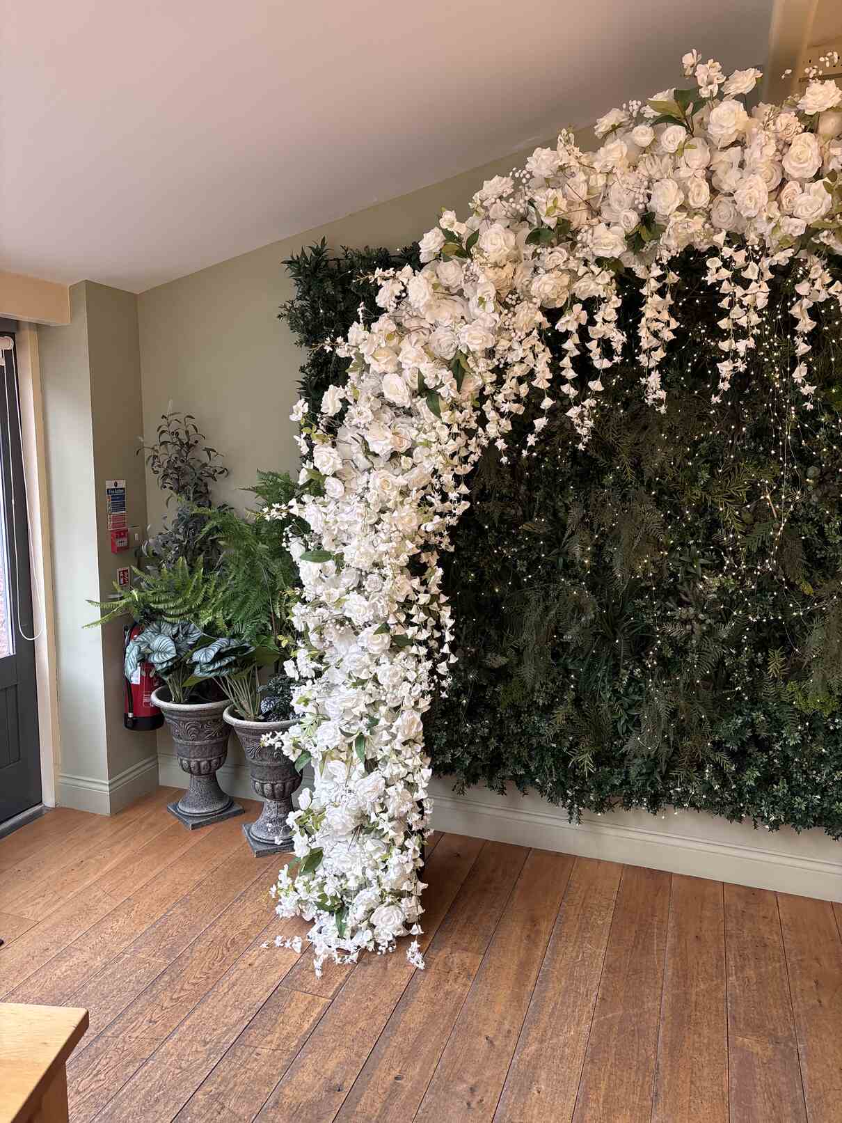 Close-up white floral arch detail