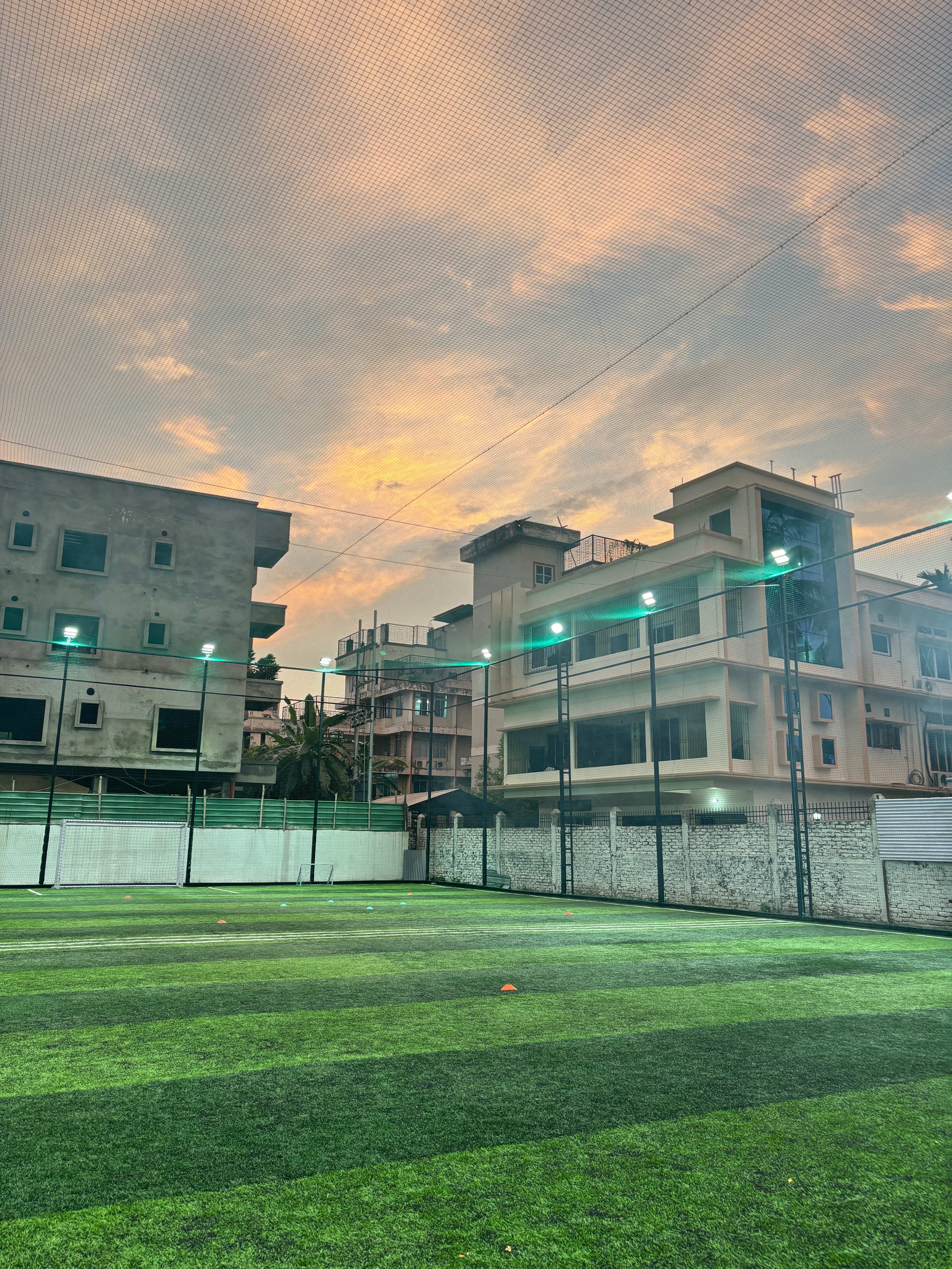 The PlayYard - Evening View with Floodlights