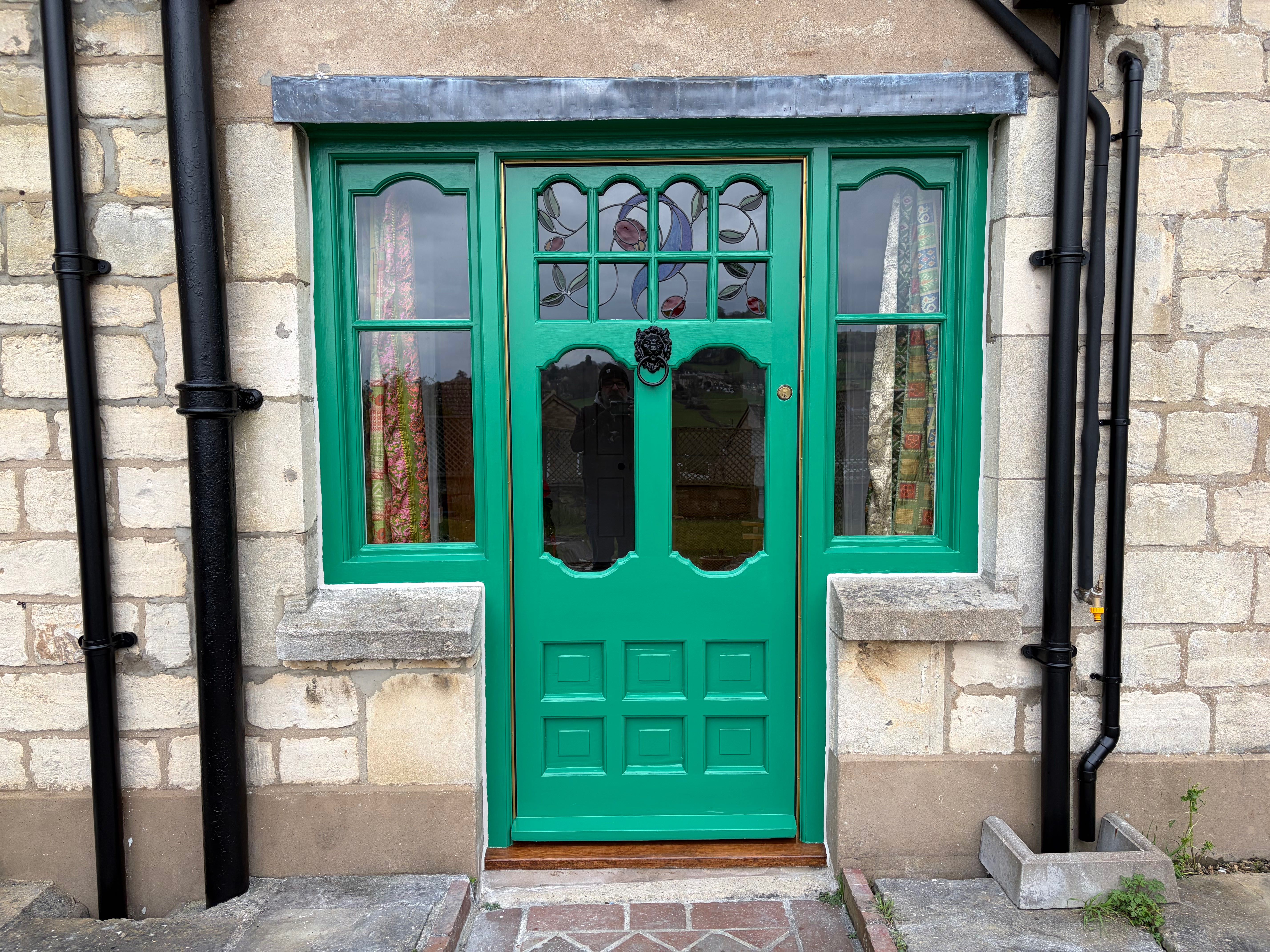 Completed emerald green Victorian front door