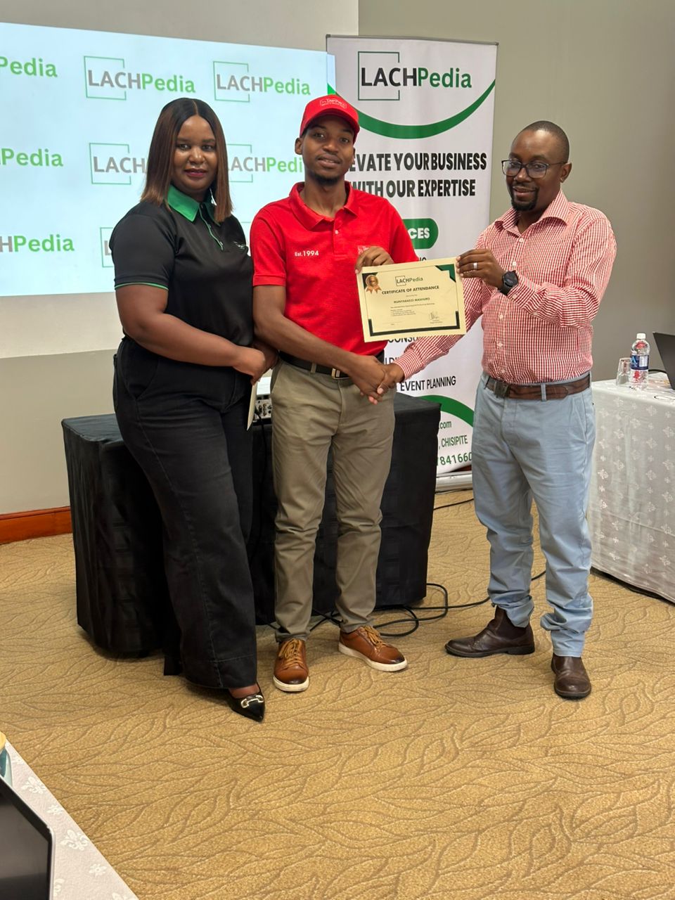 LachPedia team presenting certificate