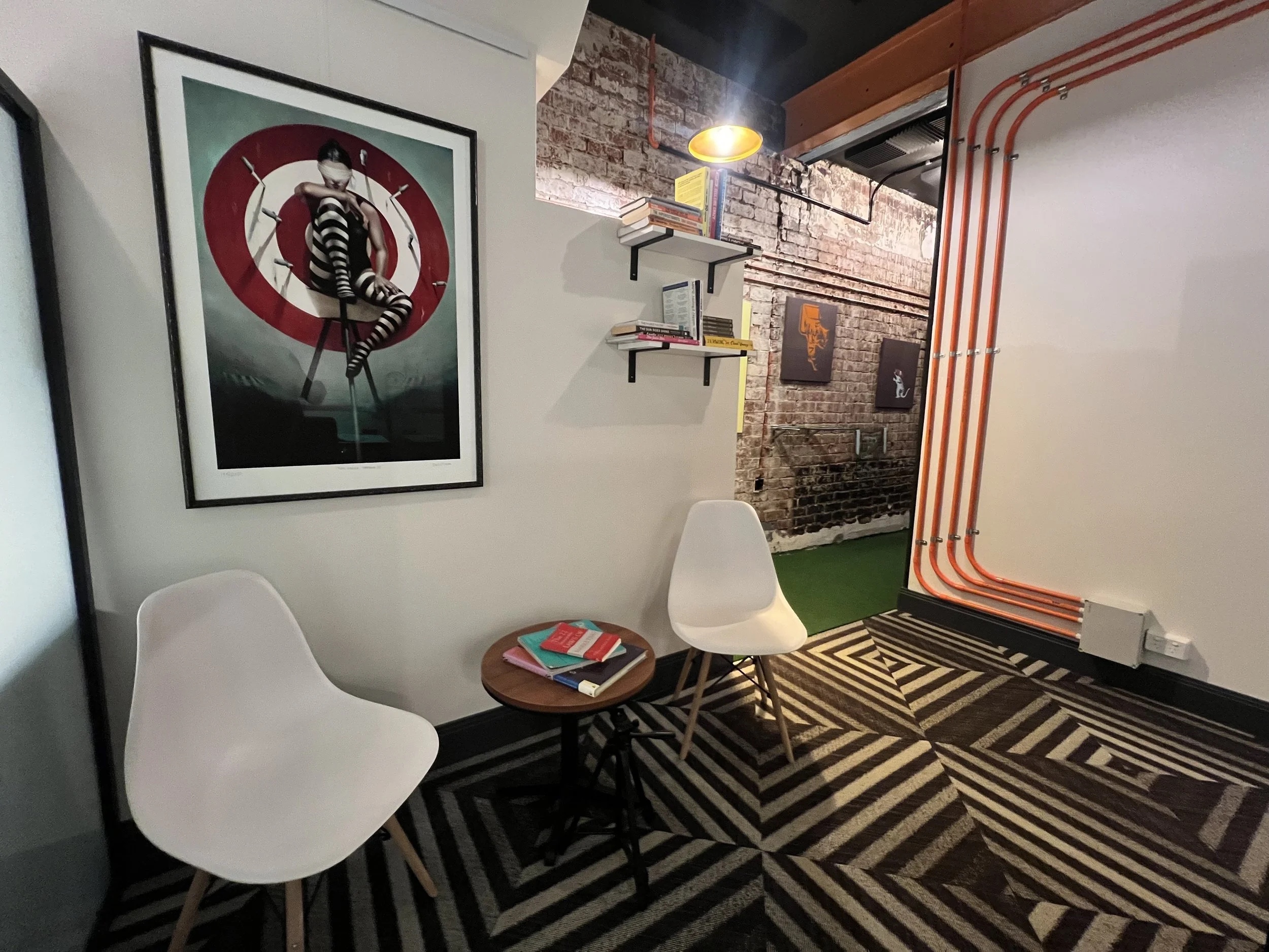 Meeting nook with artwork and seating
