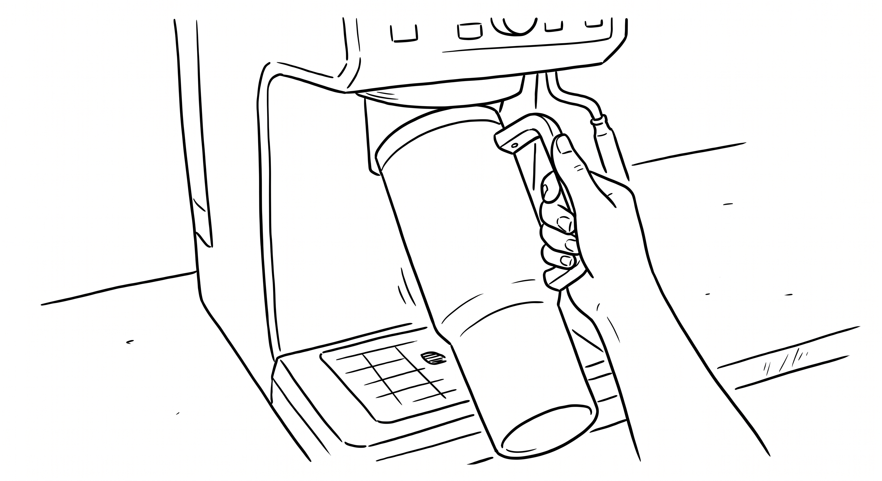 Hand holding a tumbler that doesn't fit the coffee maker