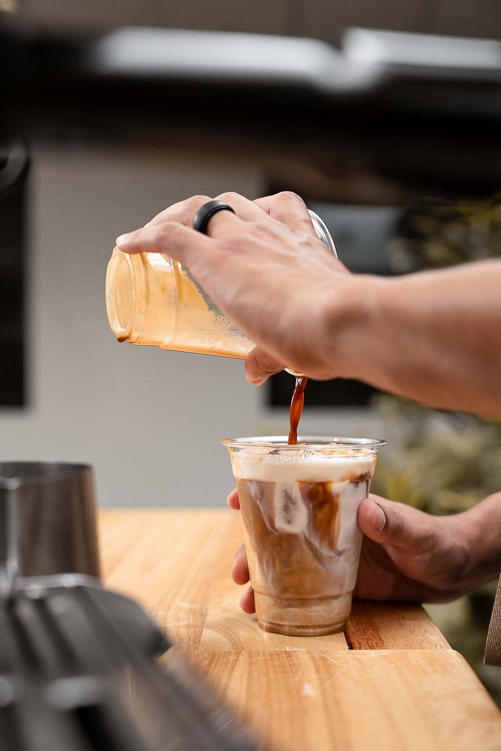 Espresso being poured with care