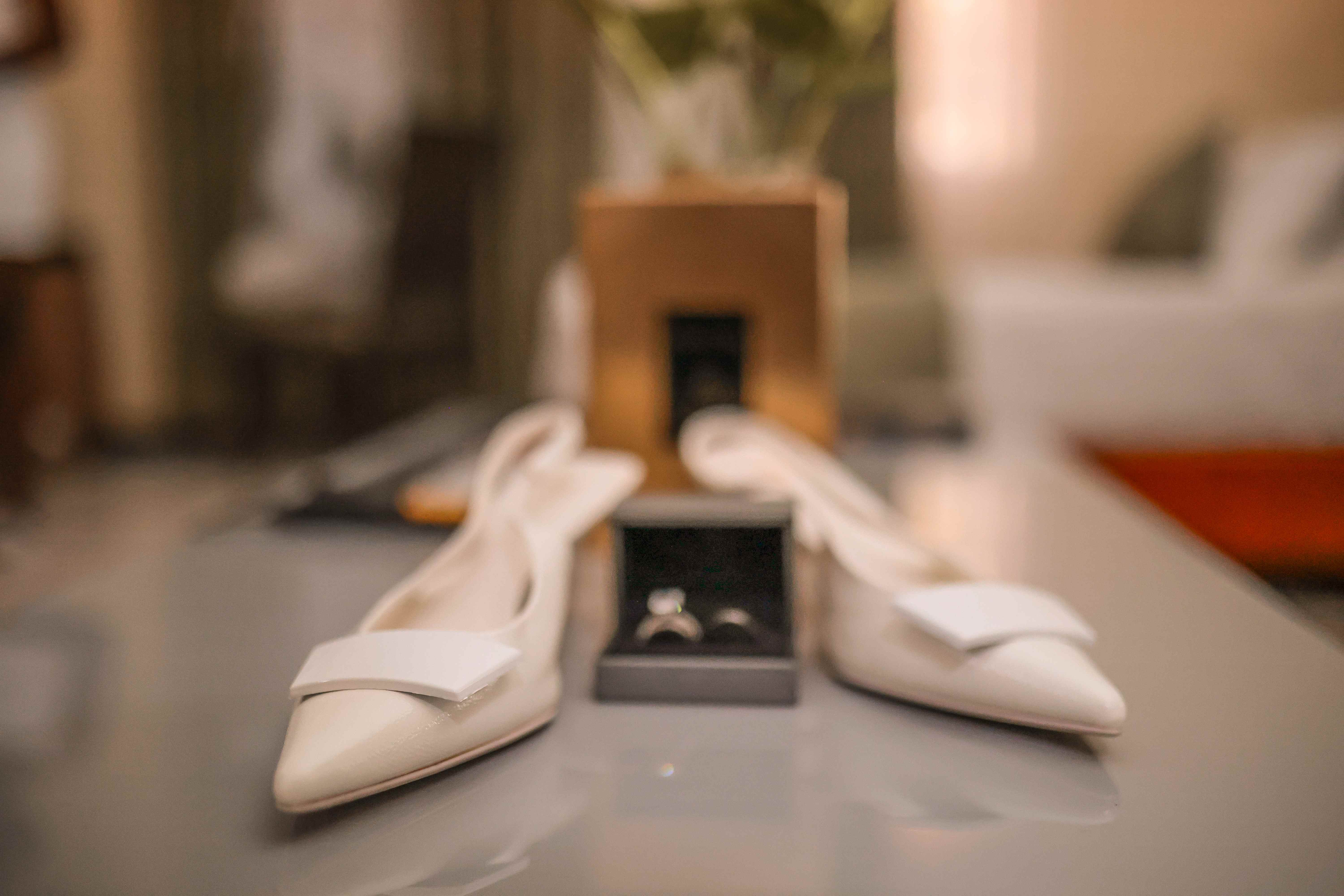 Wedding shoes and rings