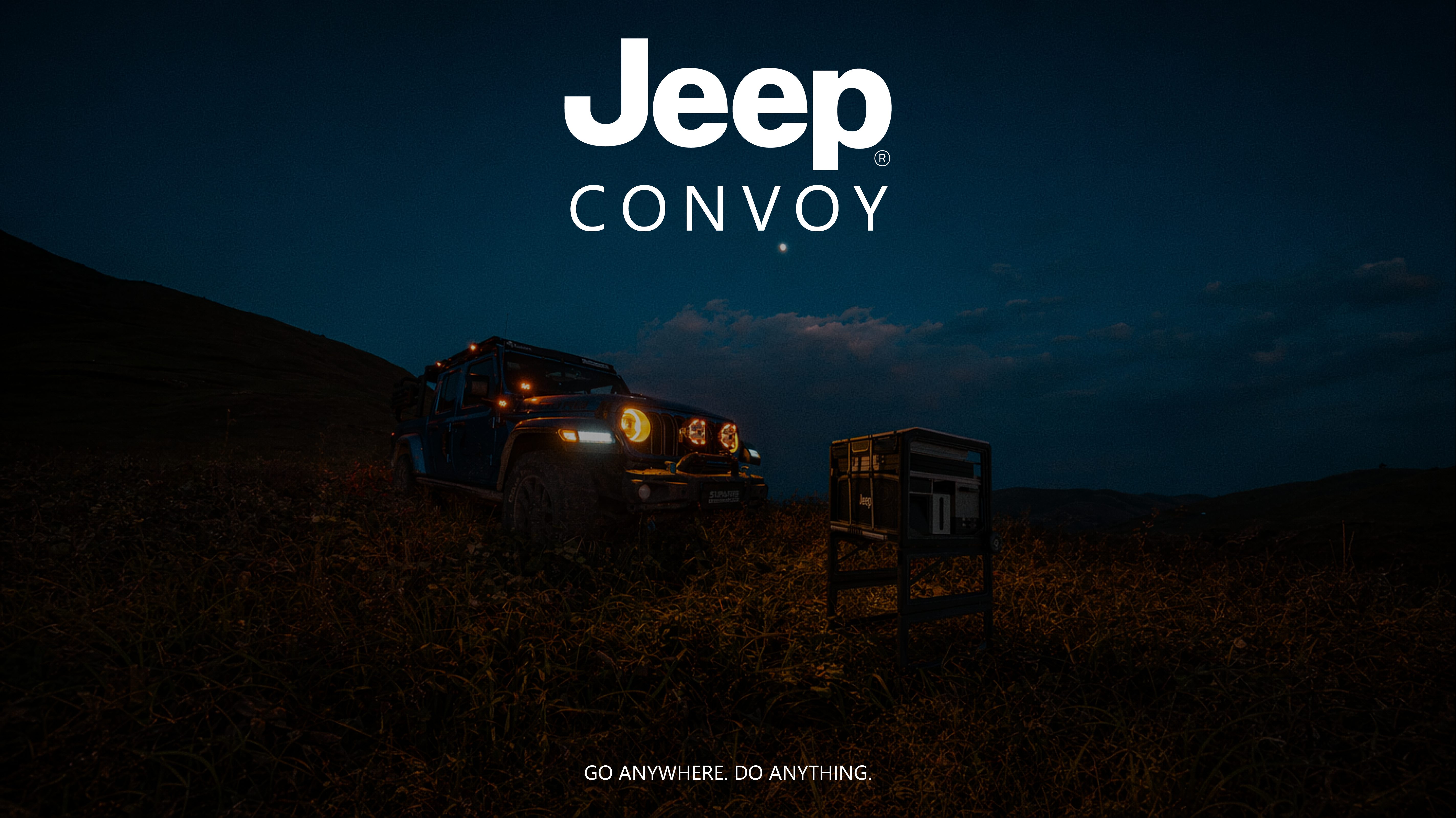 Jeep Convoy cooking system at dusk with Jeep vehicle - Go Anywhere. Do Anything.