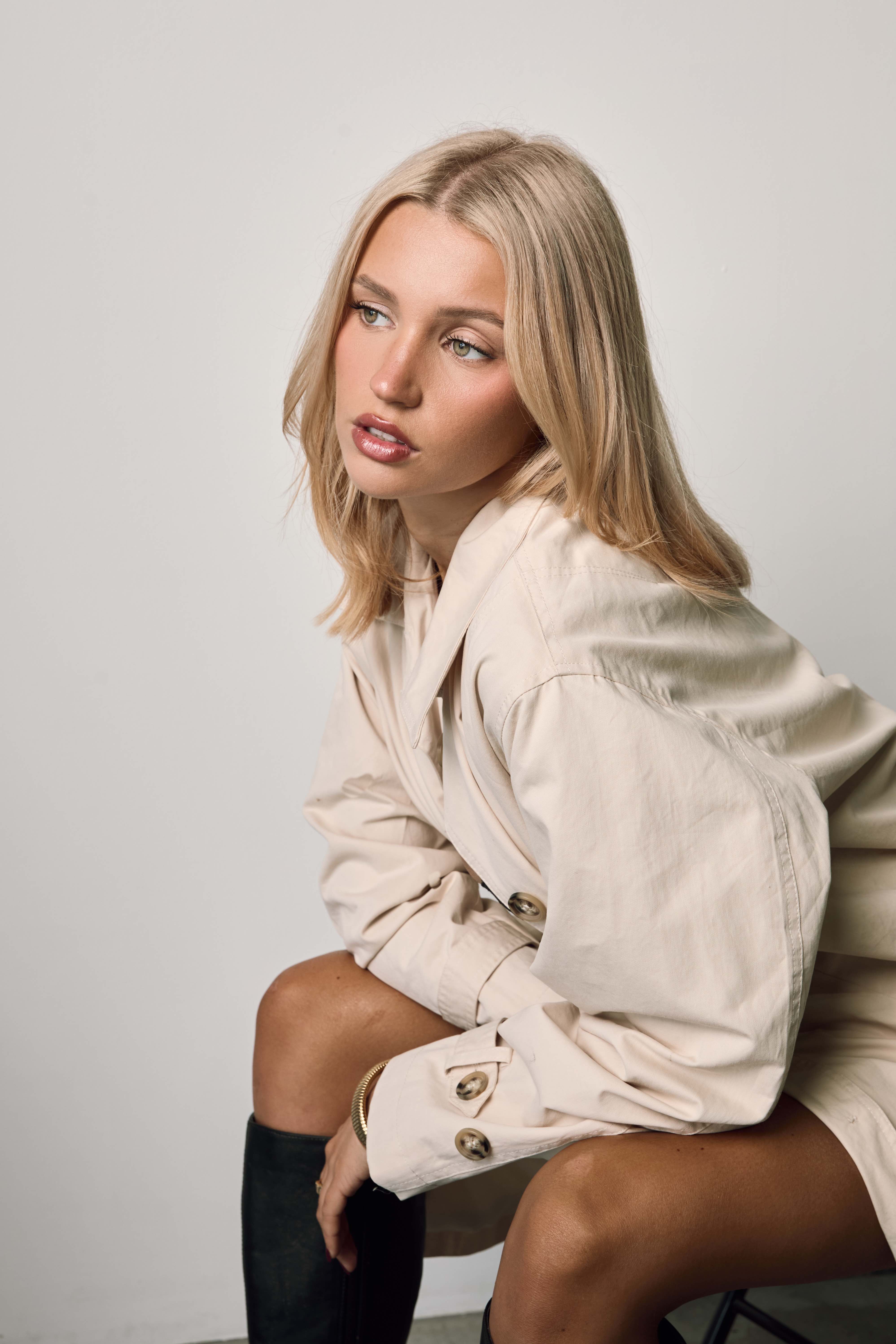 Clean-lit studio portrait on a Gold Coast set