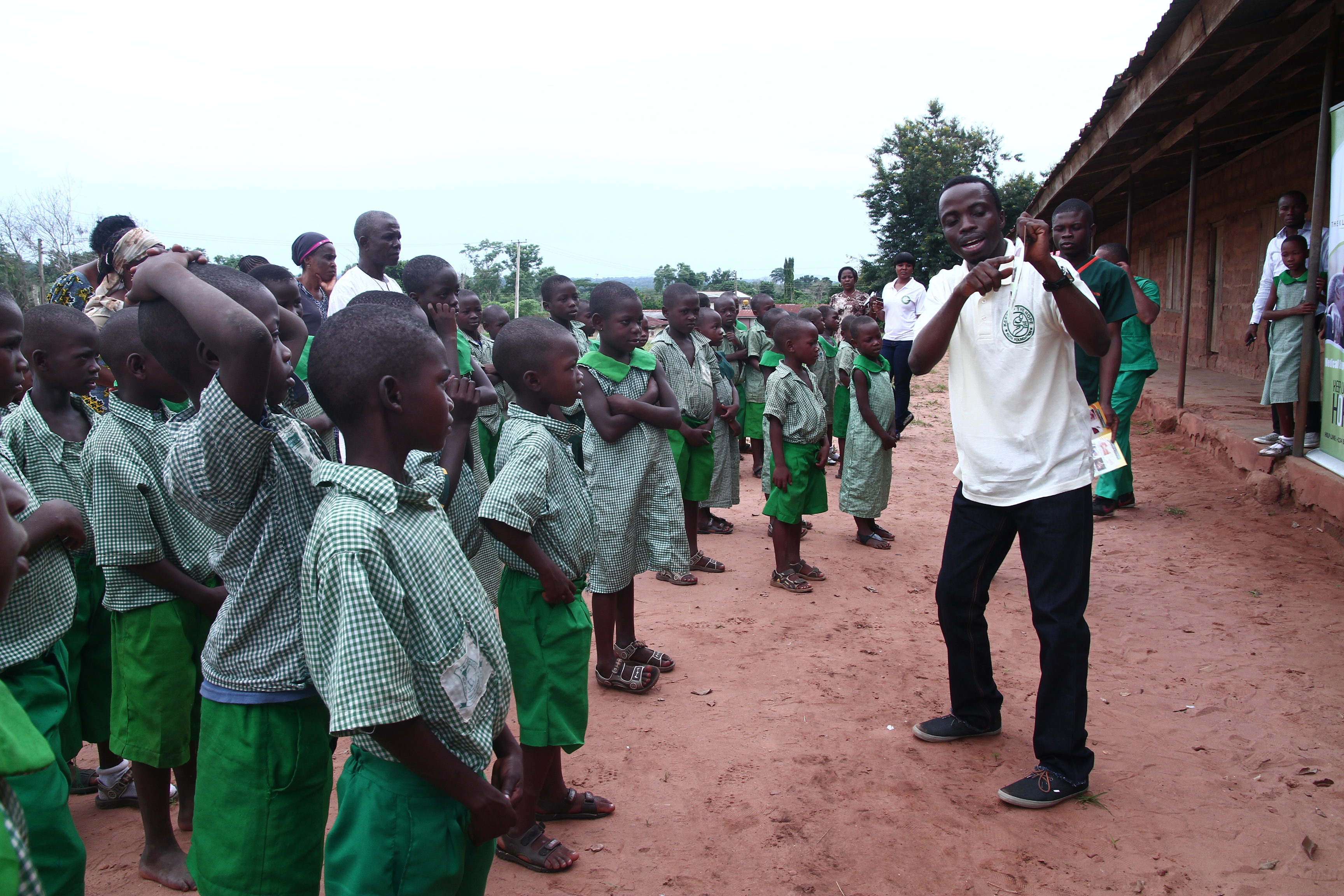 Team member engaging children in health education