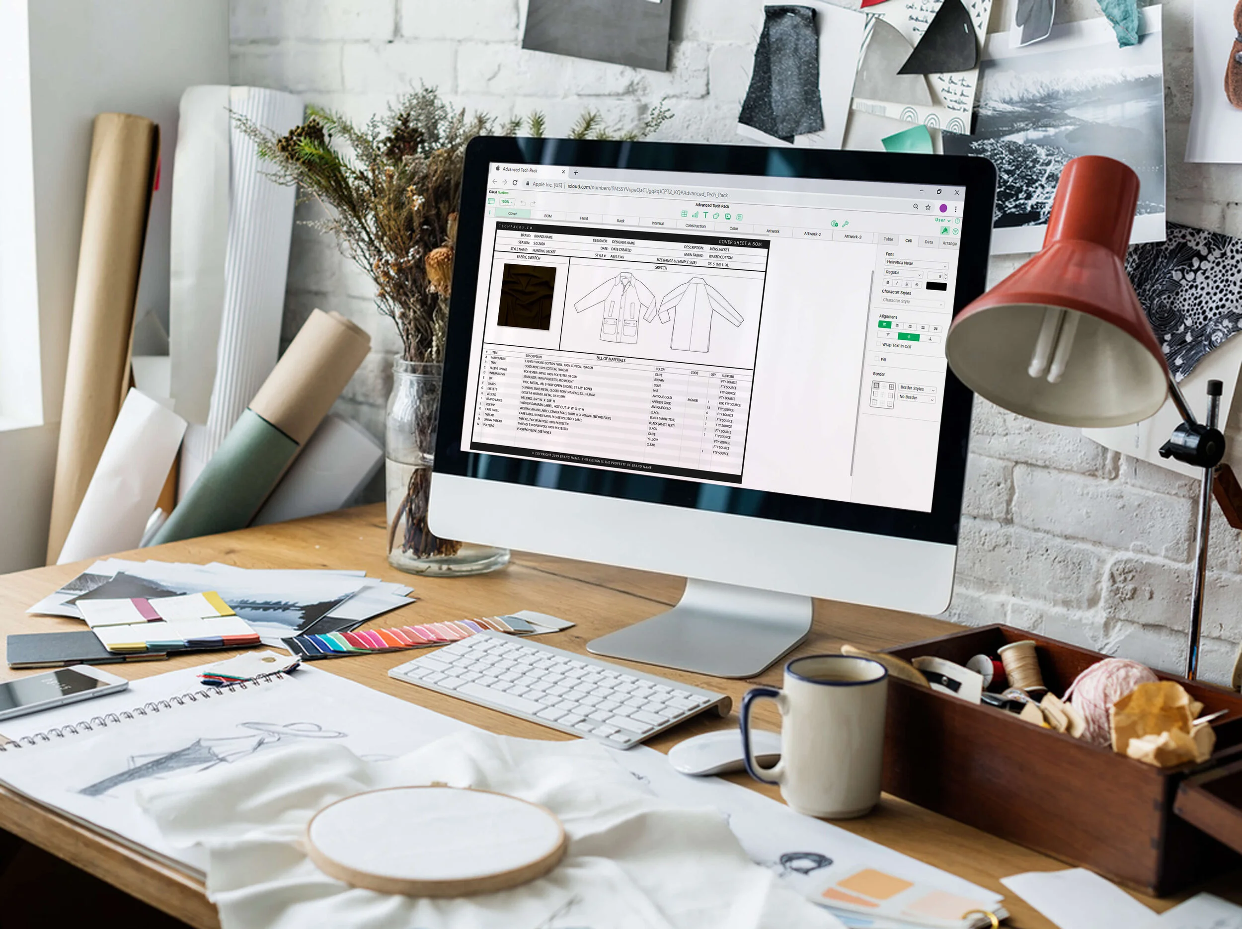 Fashion tech pack displayed on a designer workstation with garment sketches and swatches