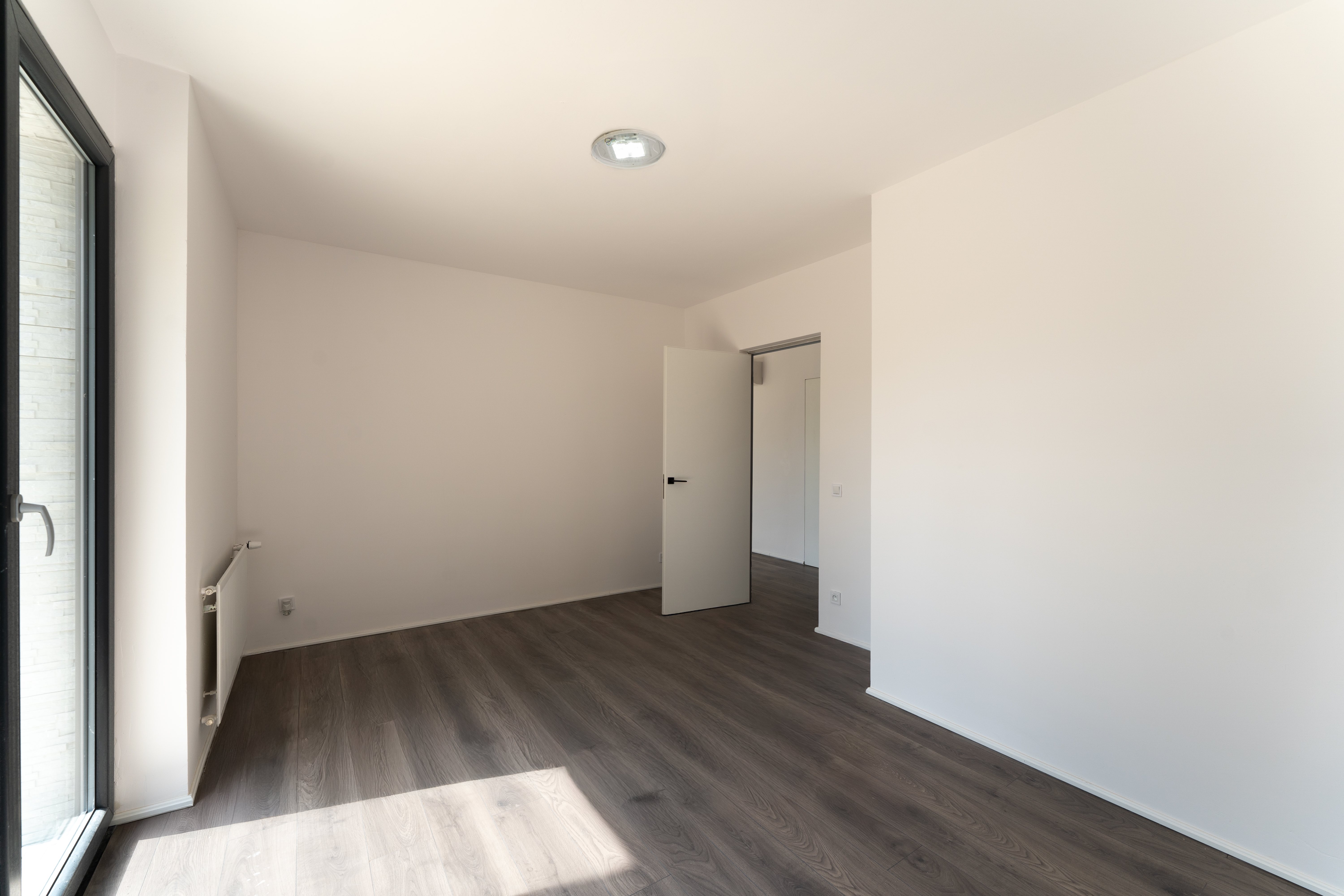 Bedroom with wooden floor