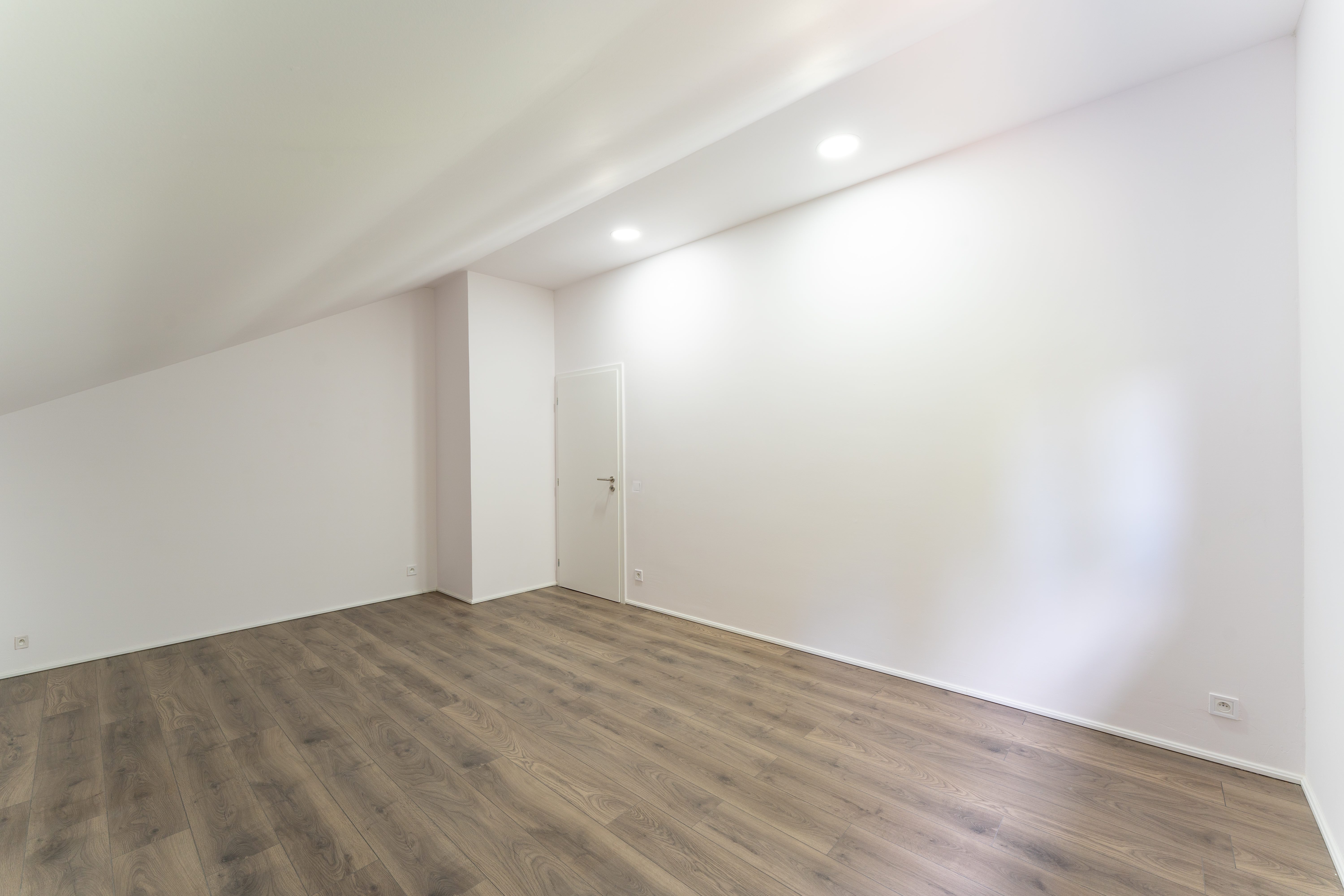 Attic room with built-in wardrobe