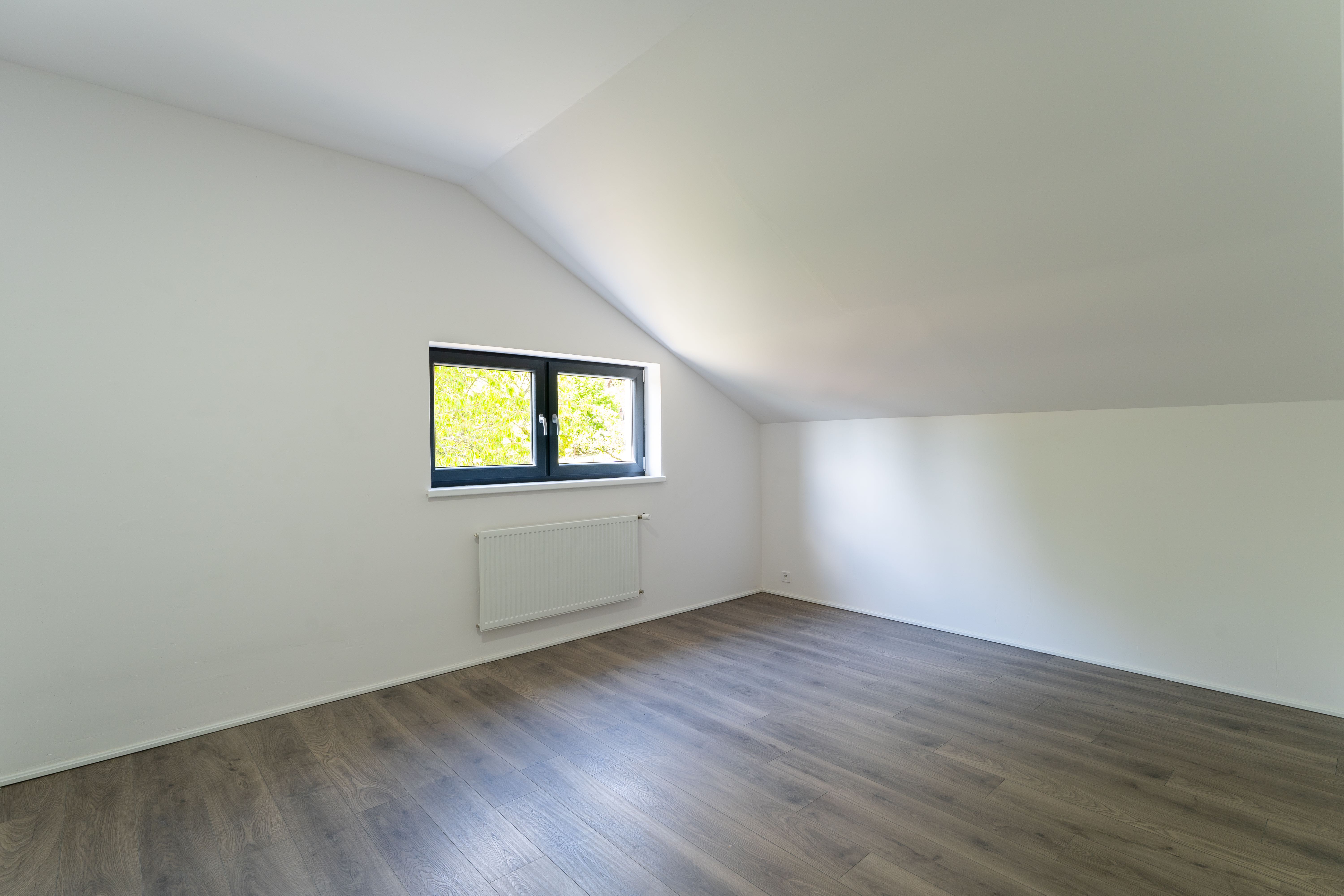 Attic bedroom with garden view