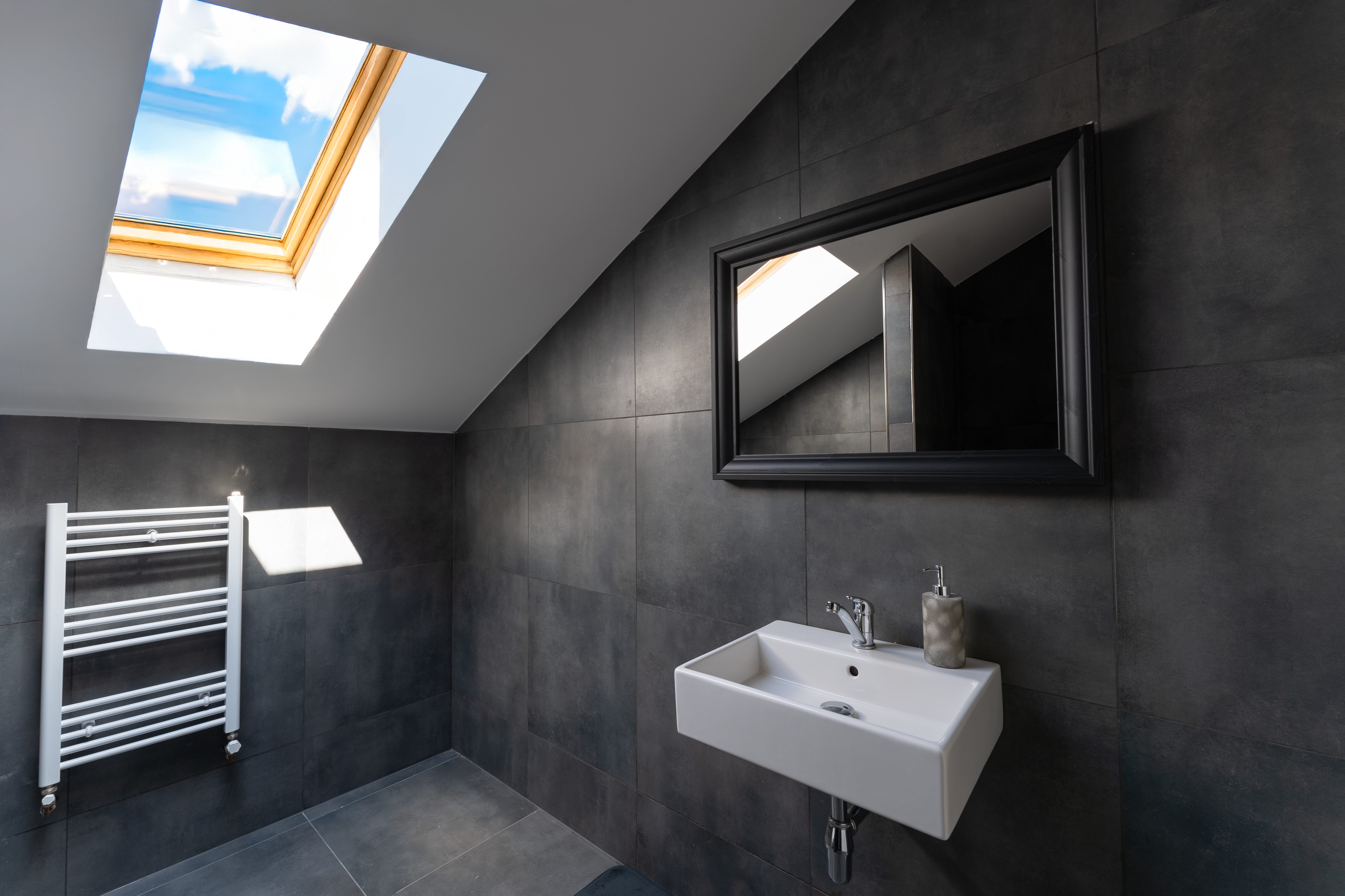 Attic bathroom with skylight