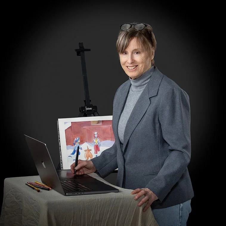 Marcia at her studio workstation