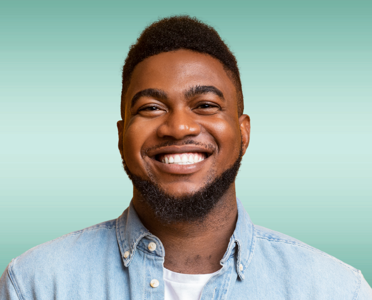 Smiling man with healthy teeth after dental cleaning