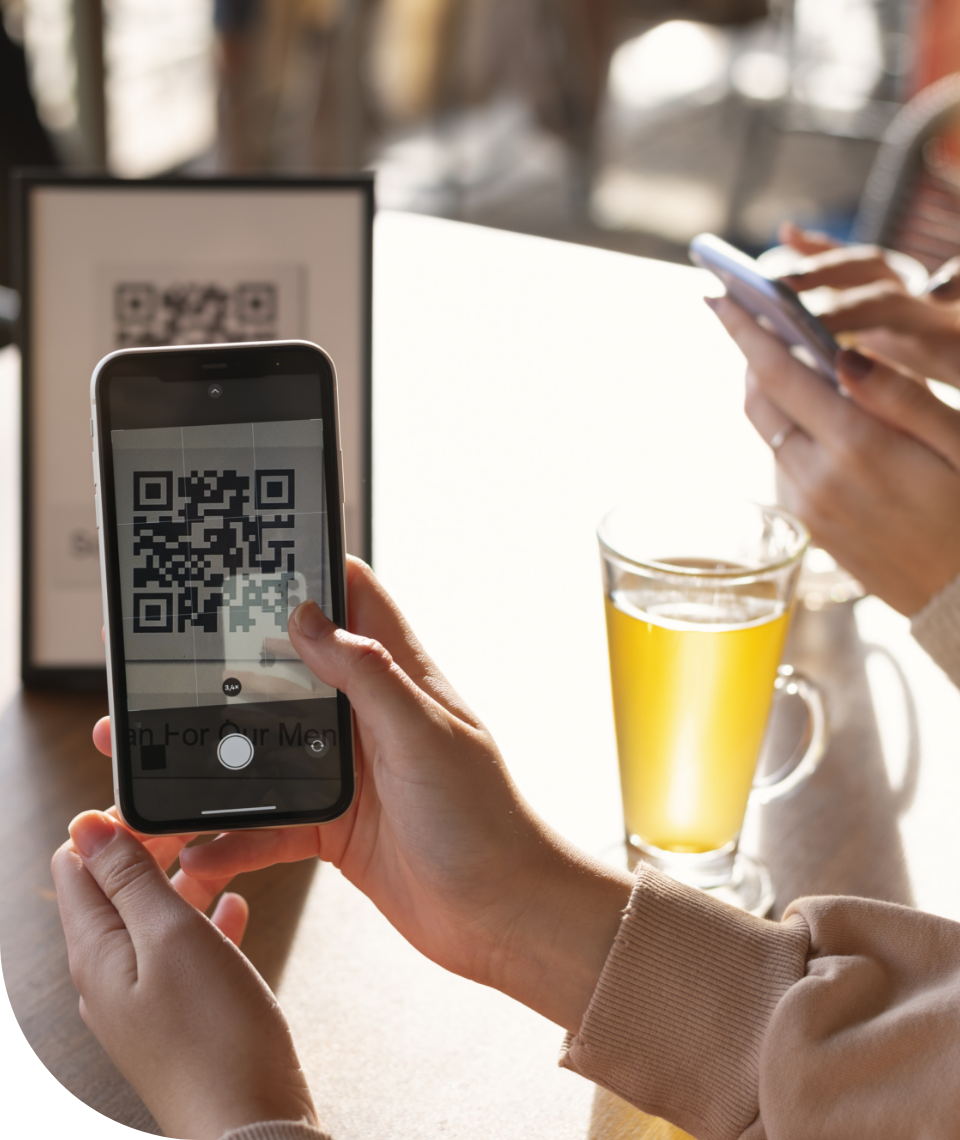 Person scanning QR code with phone