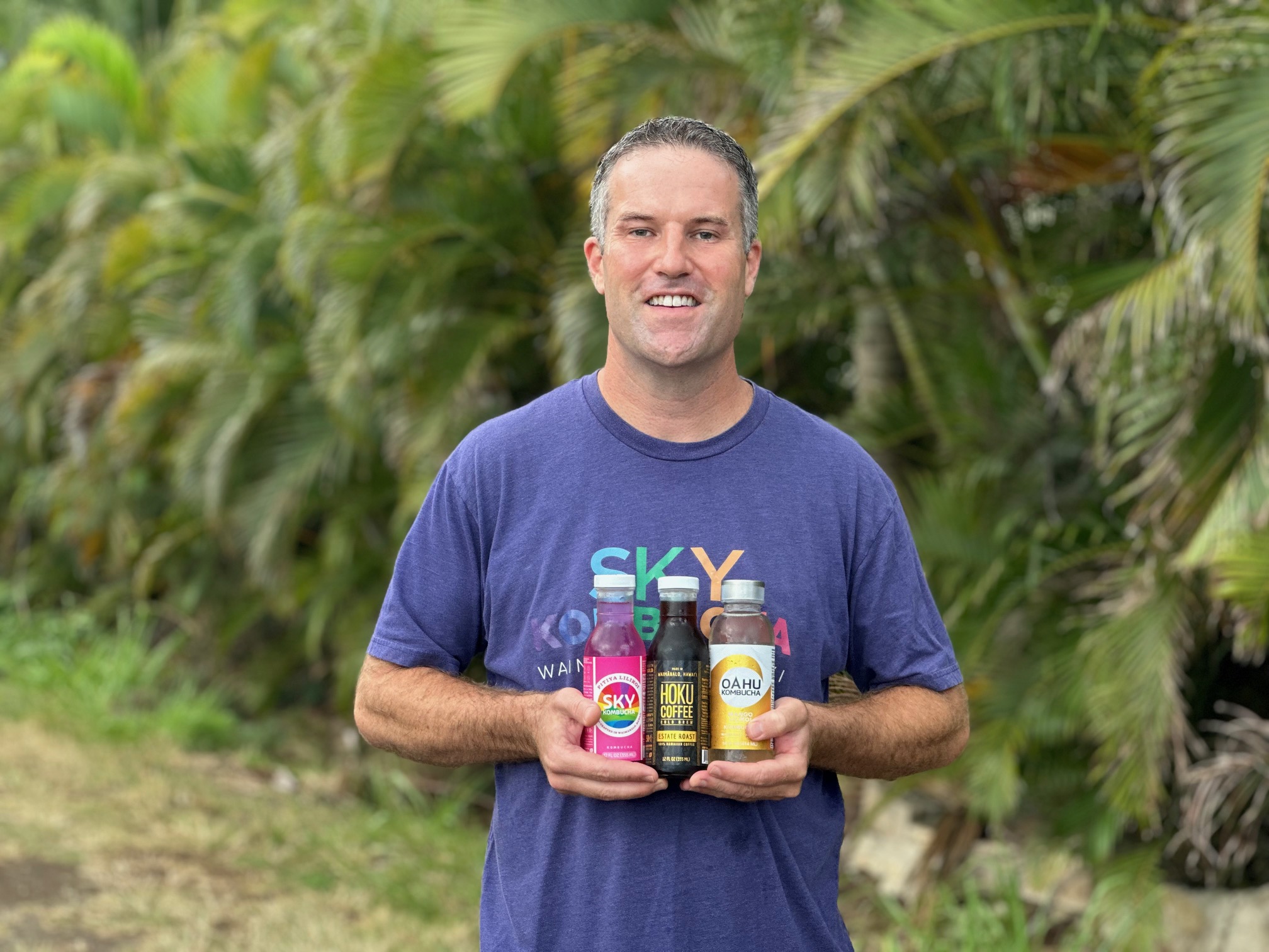 Me with 3 bottles