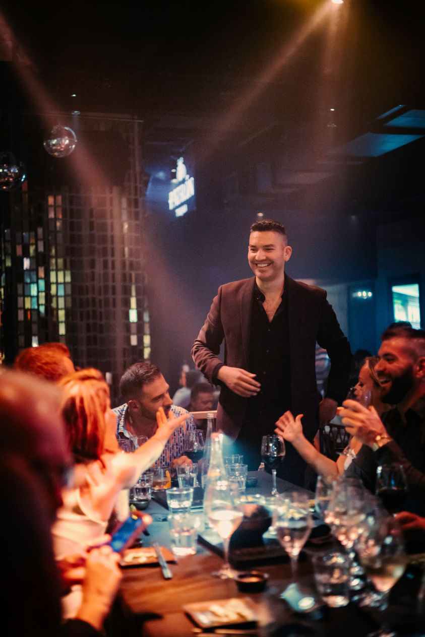 Alvaro Quevedo performing intimate close-up magic for guests