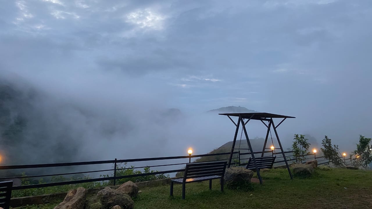 Misty morning viewpoint at Hill Monks overlooking the Vagamon valley