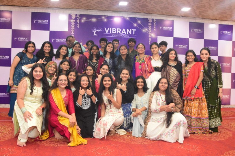 Navratri celebration - Large group photo at Vibrant backdrop