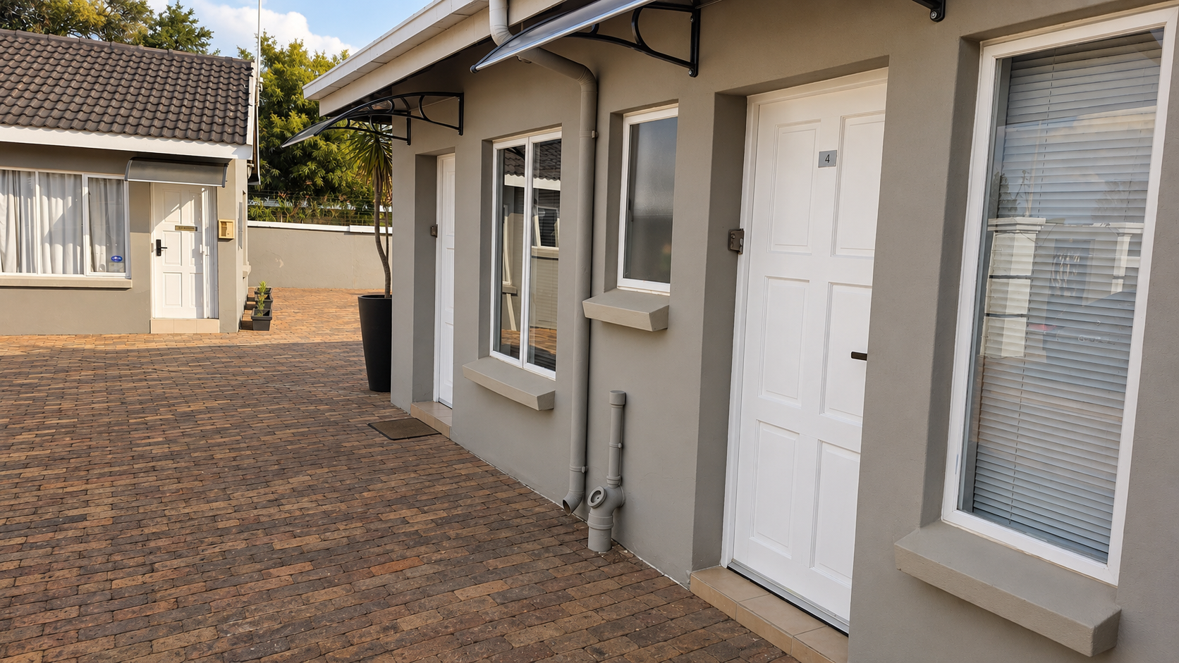 Lodge exterior with units and courtyard
