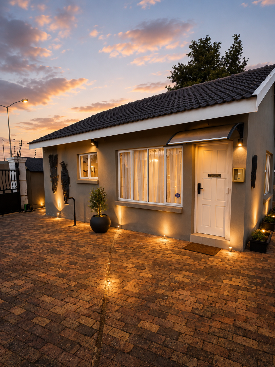 Phola Lodge exterior at sunset