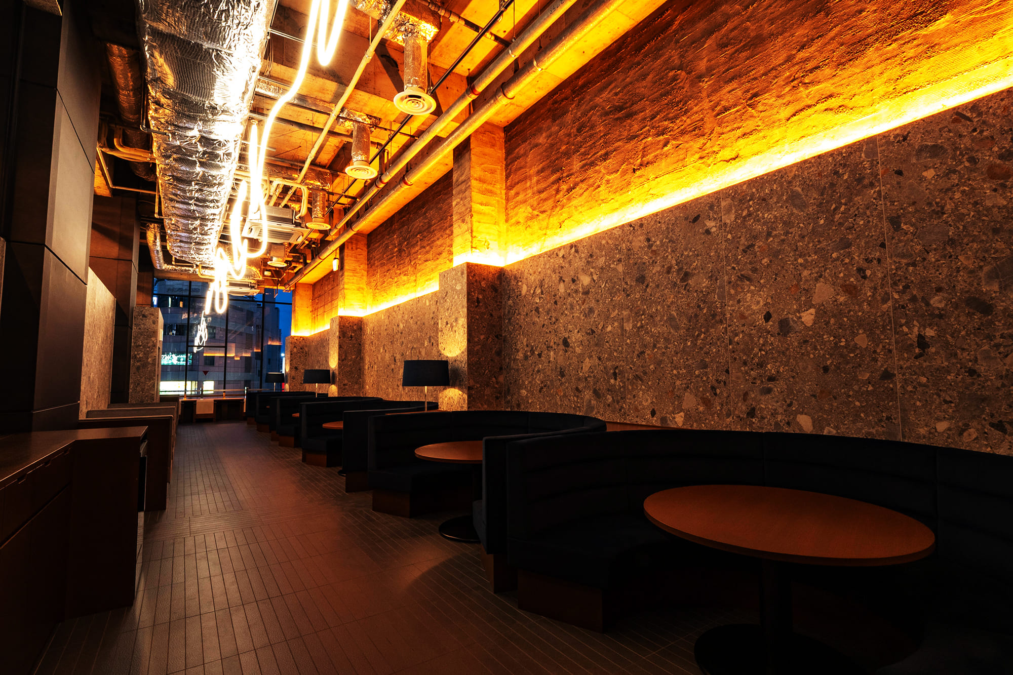 Moody bar with curved booth seating