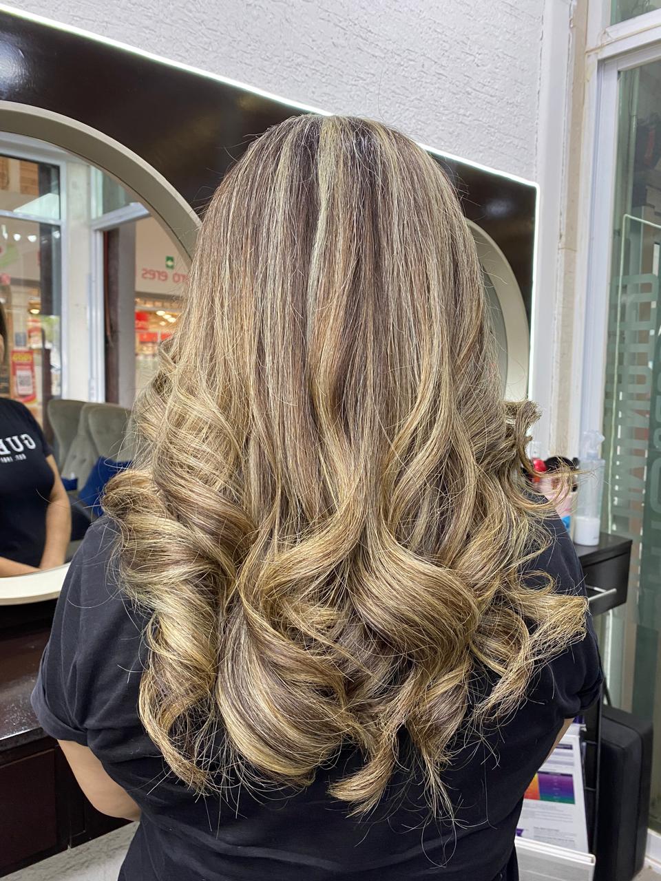 Blonde highlighted wavy hair