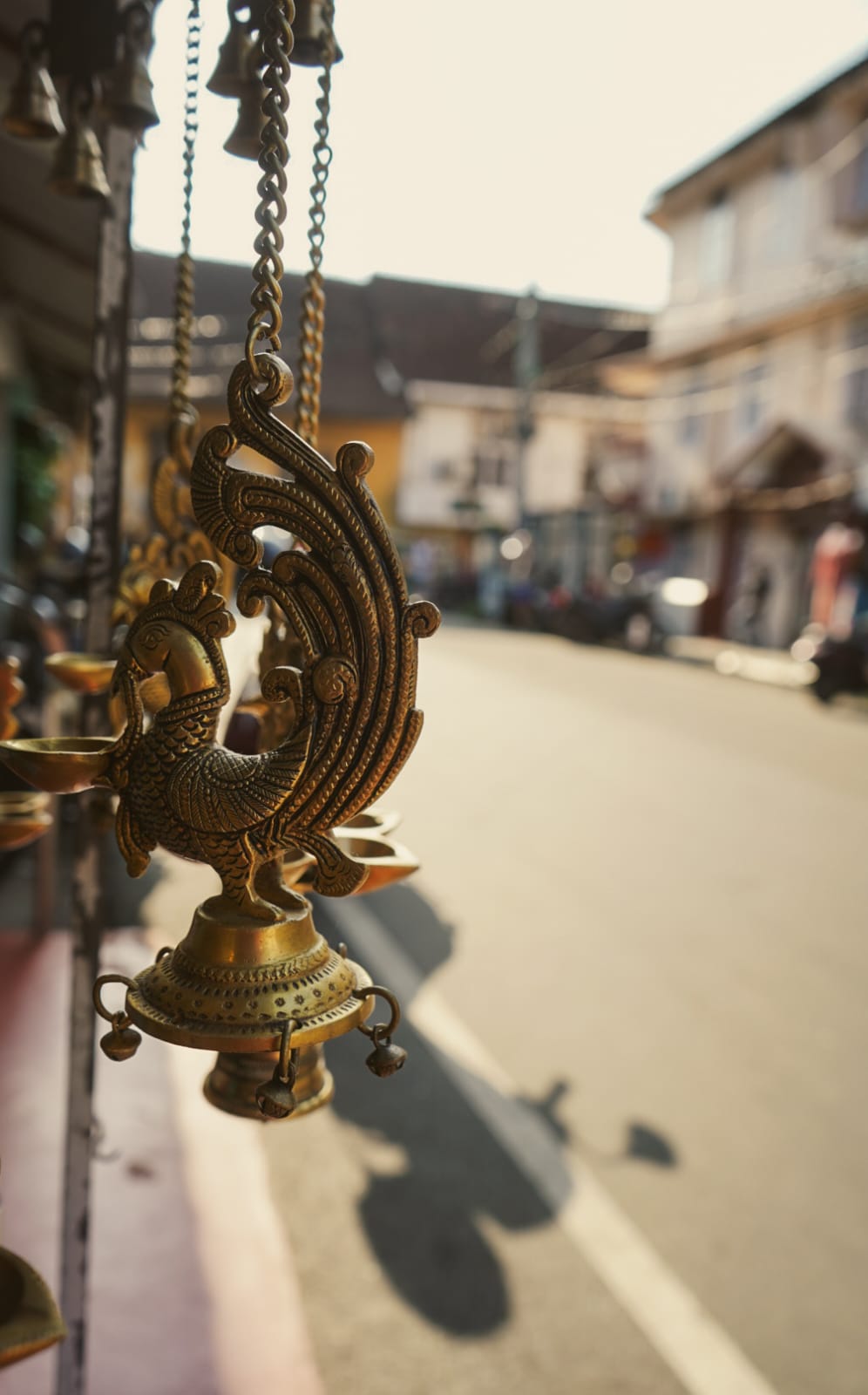 Traditional brass peacock oil lamp - Kerala craftsmanship