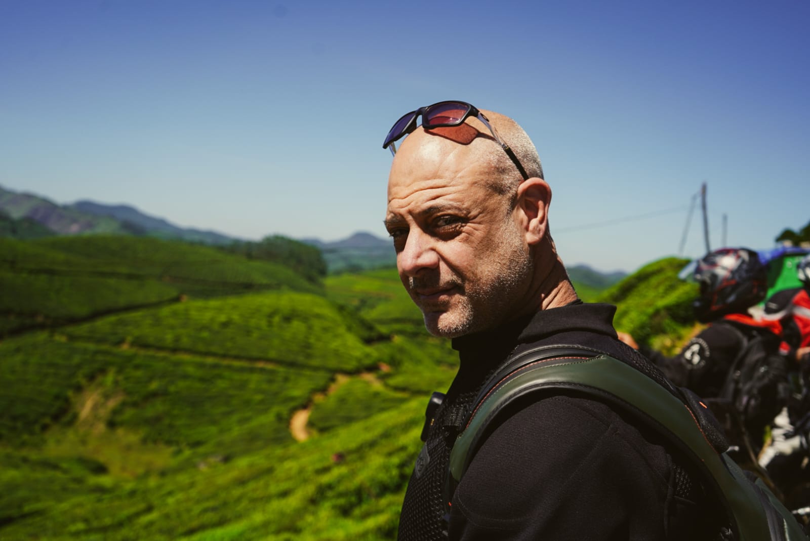 Male traveler portrait at Munnar tea hills viewpoint