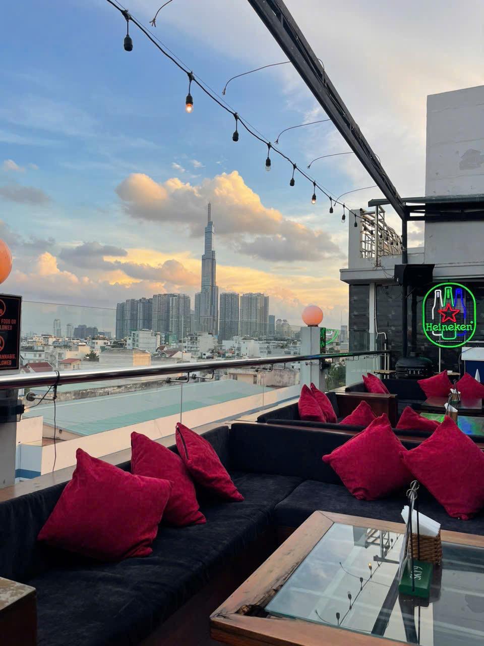 Daylight rooftop lounge overlooking Ho Chi Minh City