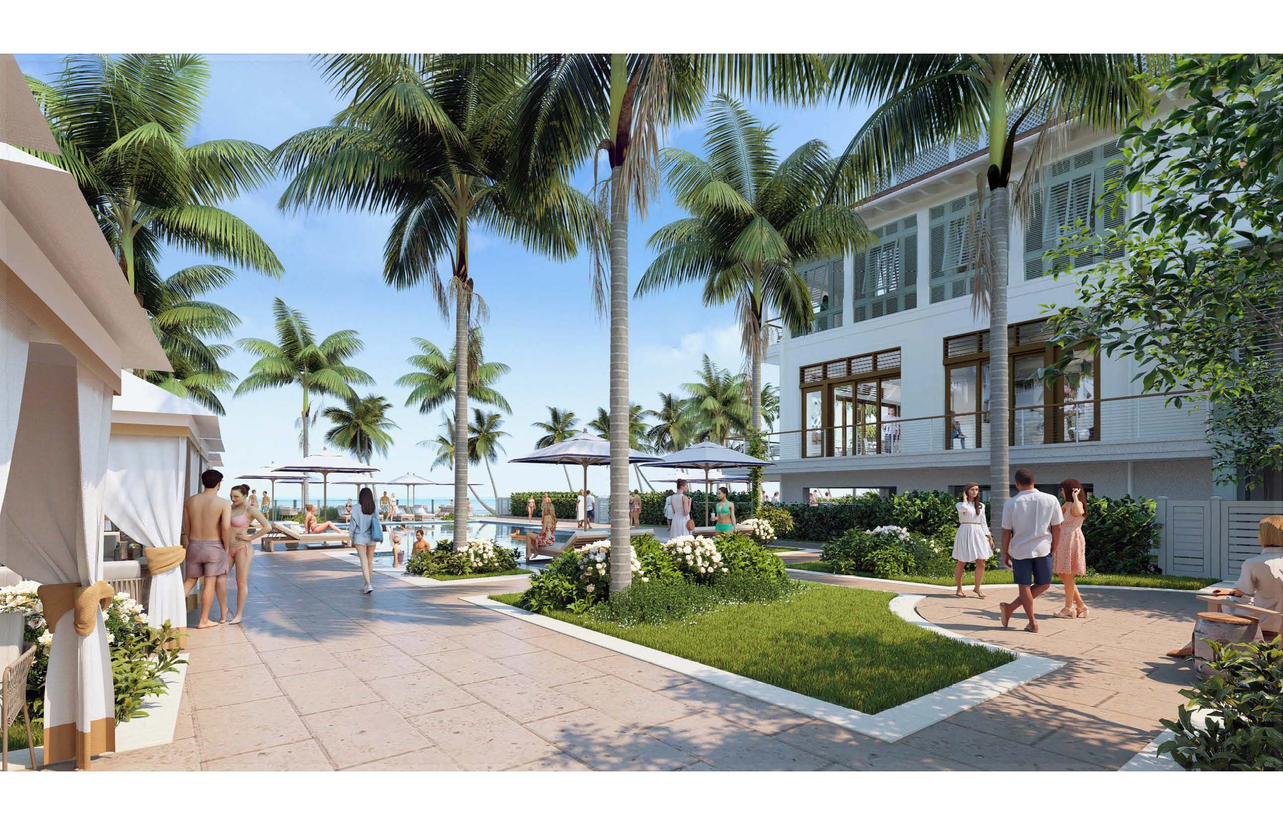Port Royal Club courtyard walkway with palm trees leading to the pool area