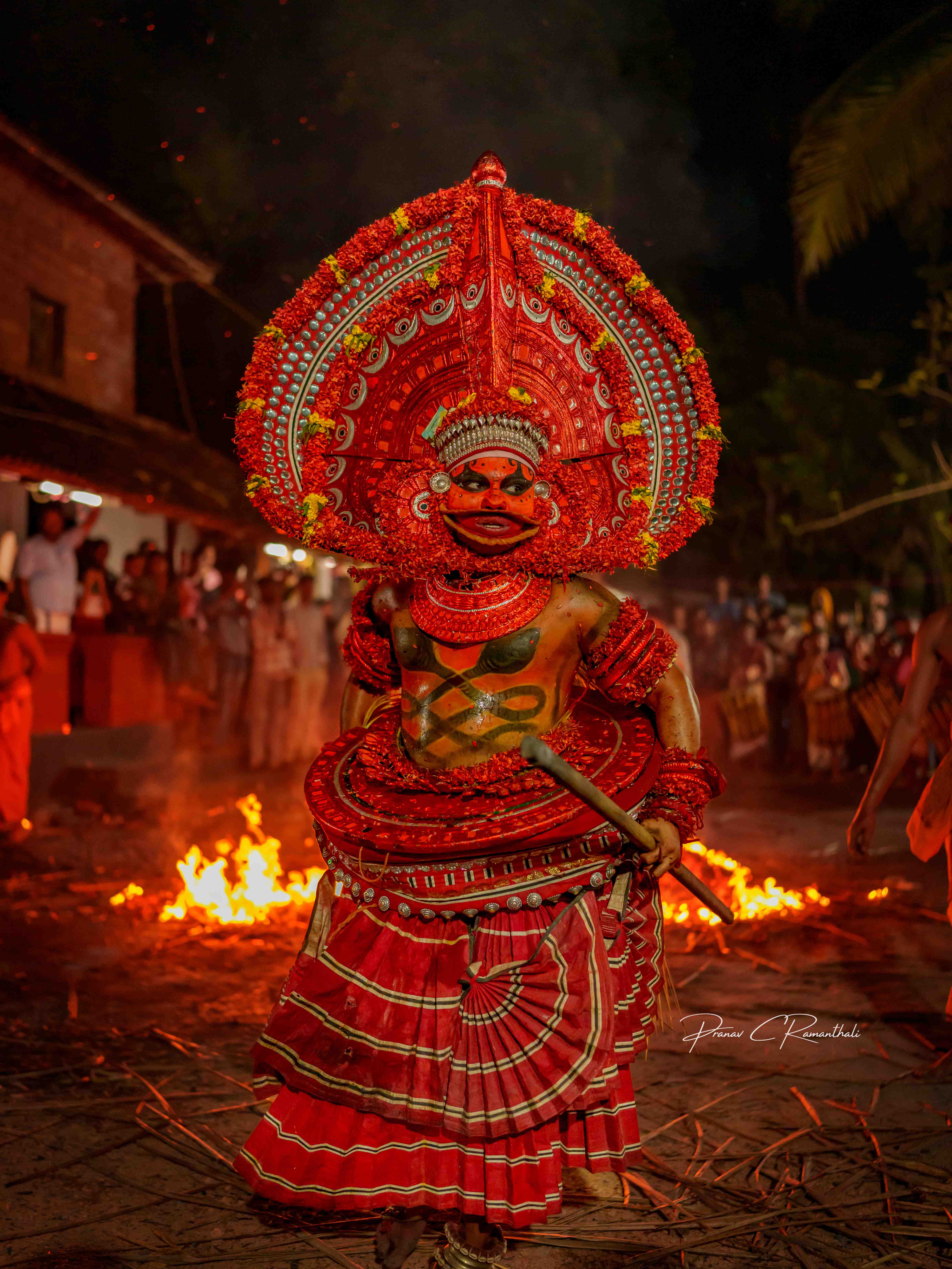 Portrait of Theyyam performer in full costume