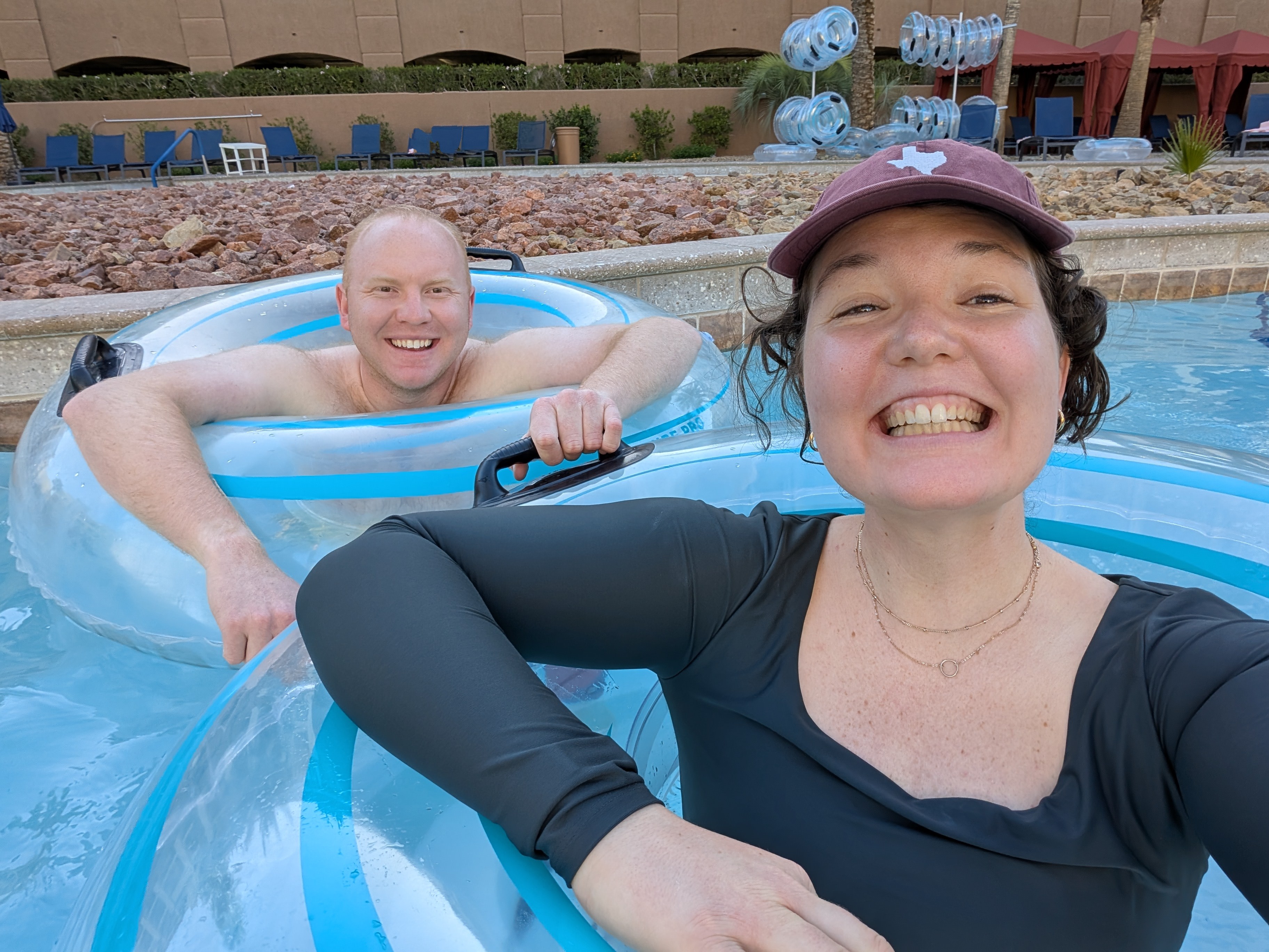 Sydney & Bryan in pool floats