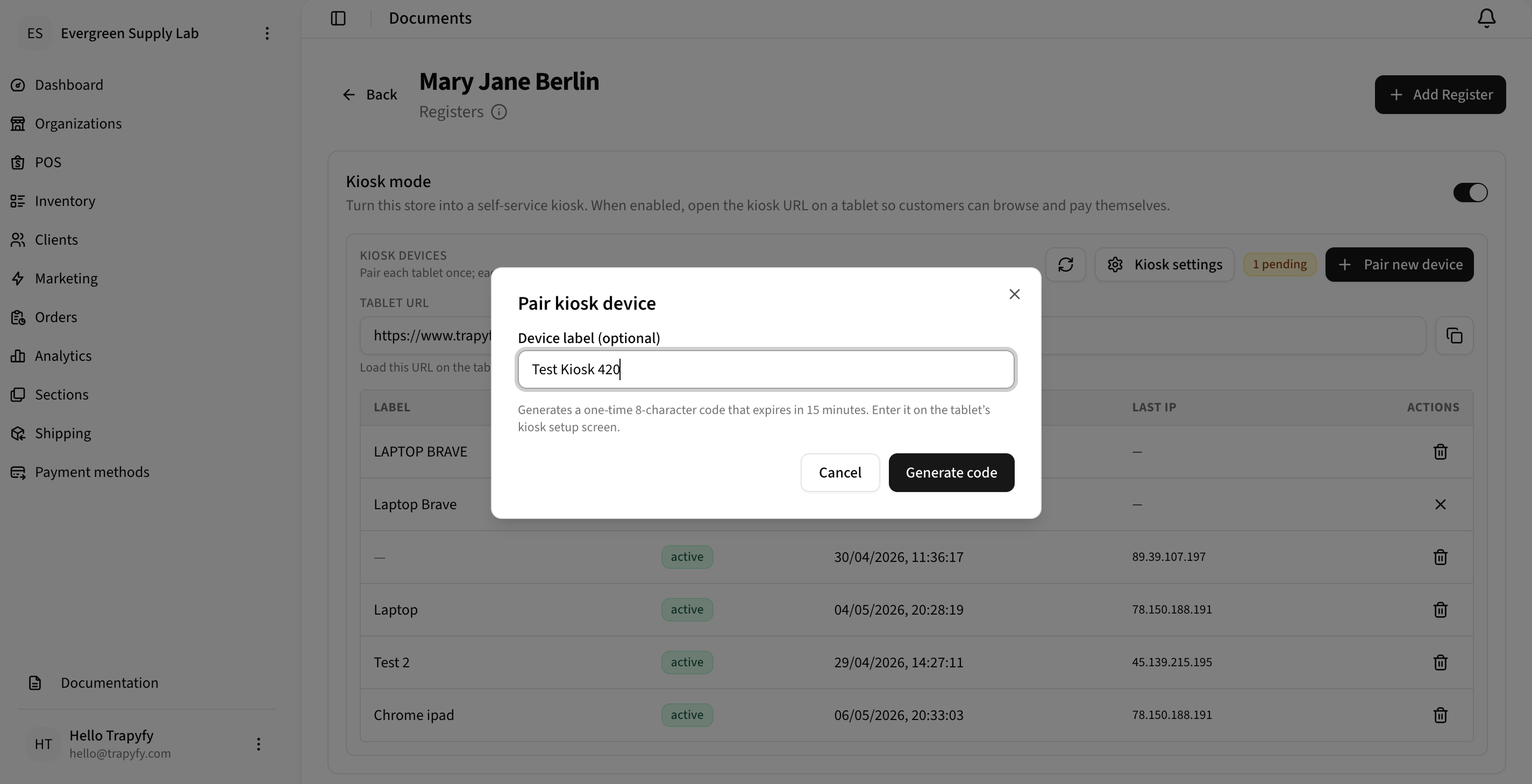 Pair kiosk device modal with Device label field showing Test Kiosk 420 and Generate code button