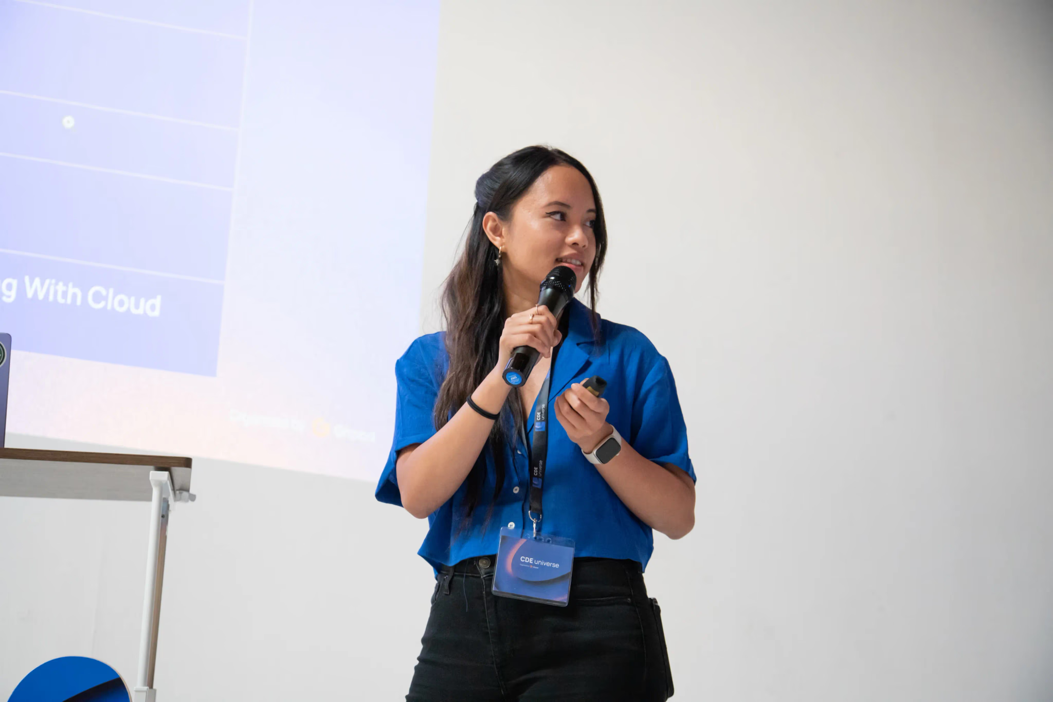 A person speaking at a conference