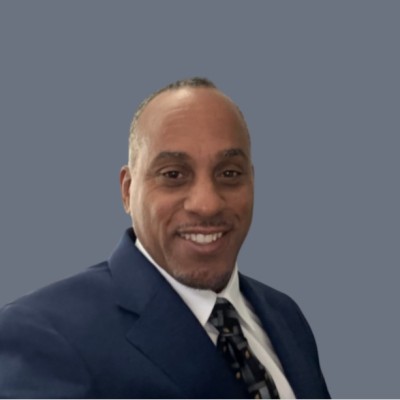 Phillip L. Smith wearing a navy suit