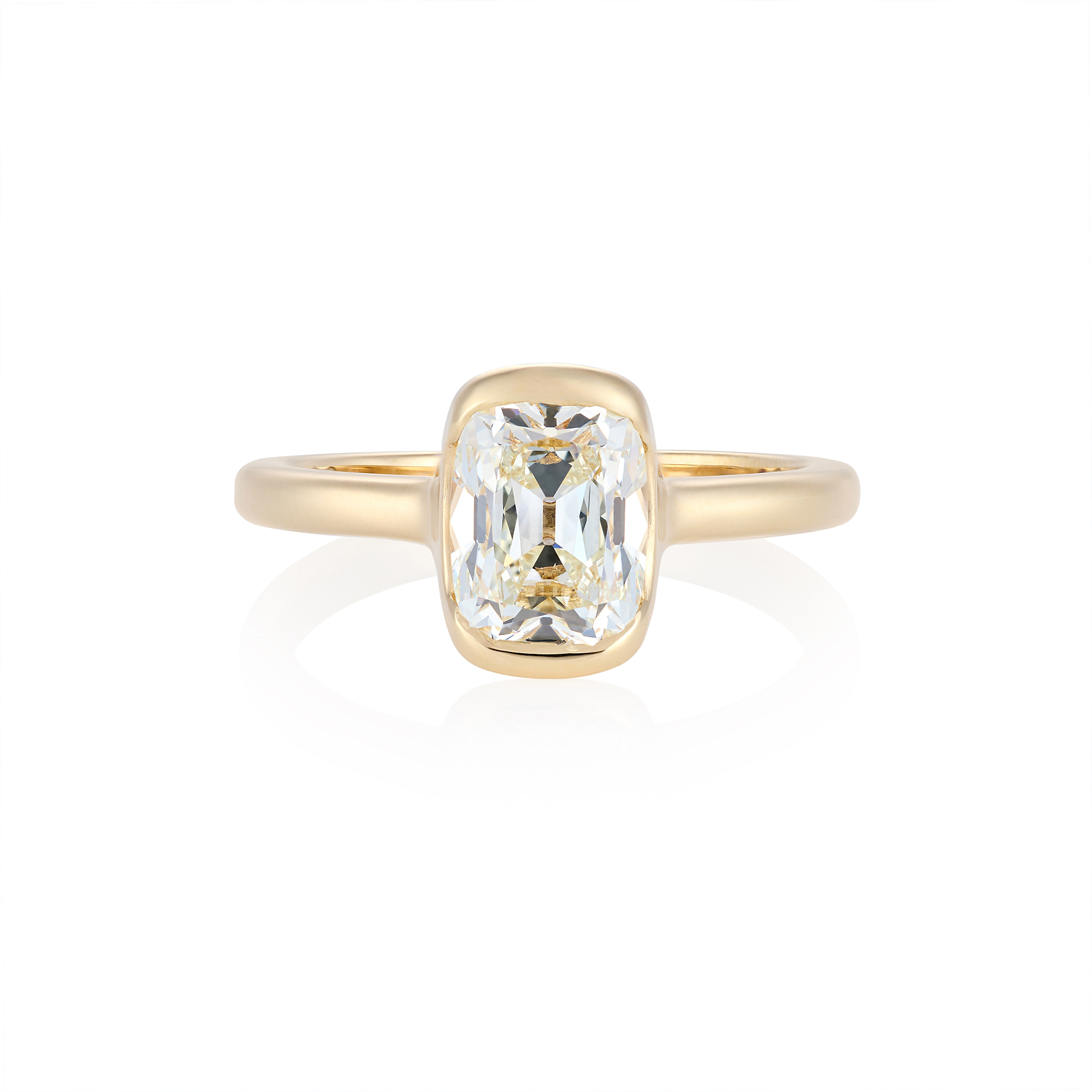 Old mine half bezel with pave bridge, lying flat white background