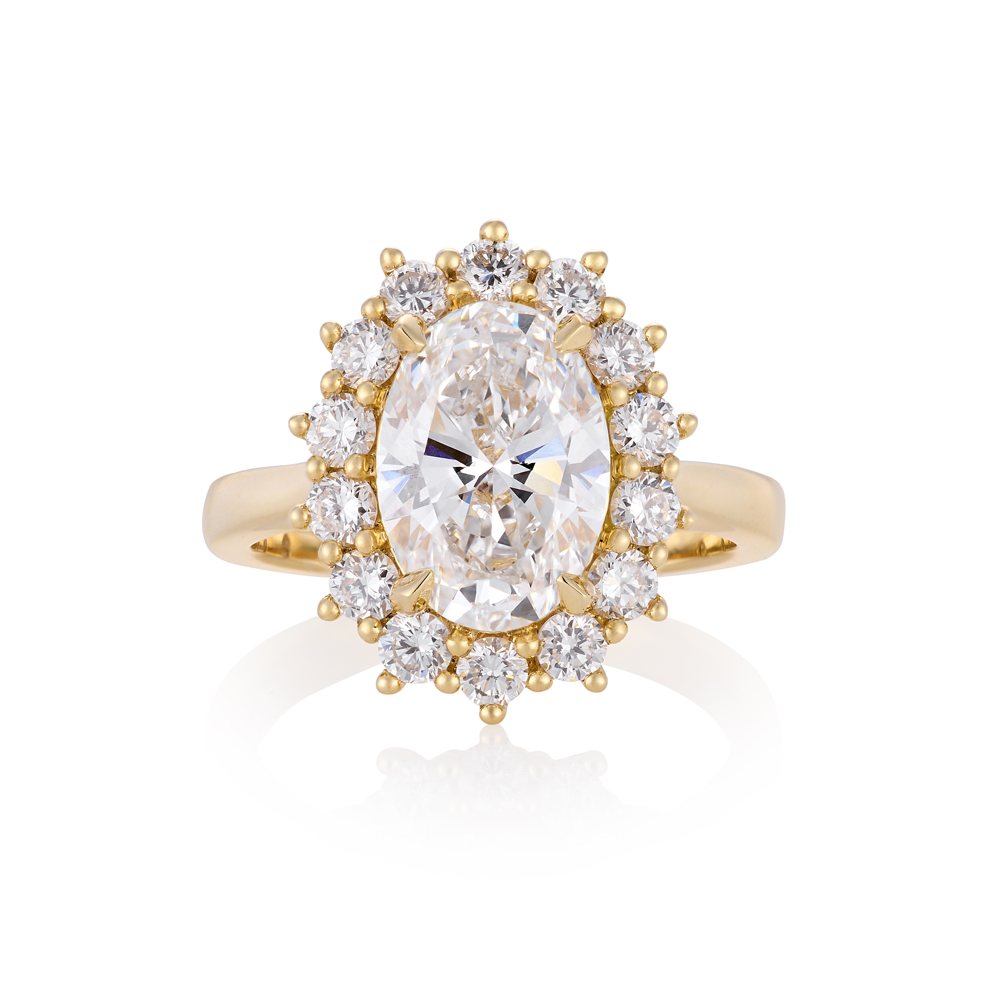 Oval diamond with star halo, lying flat white background