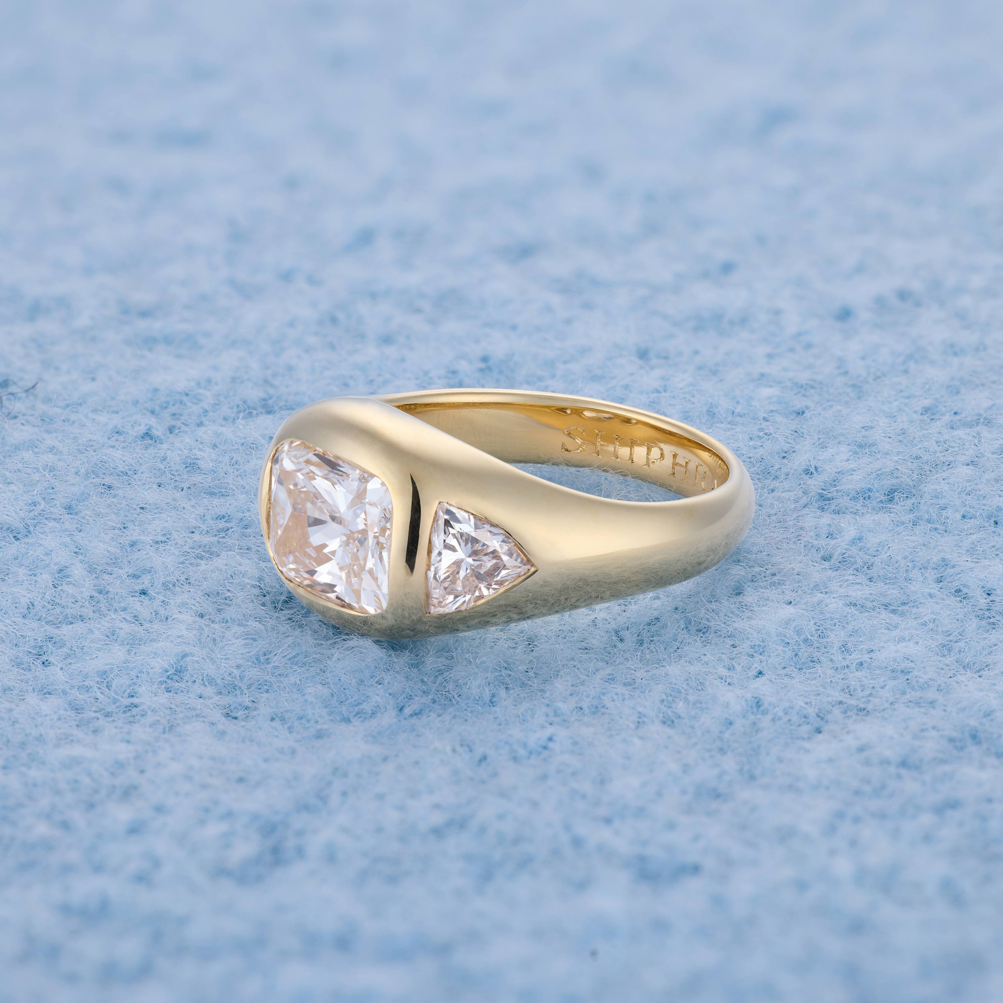 Cushion cut with trillion shoulders, side angle