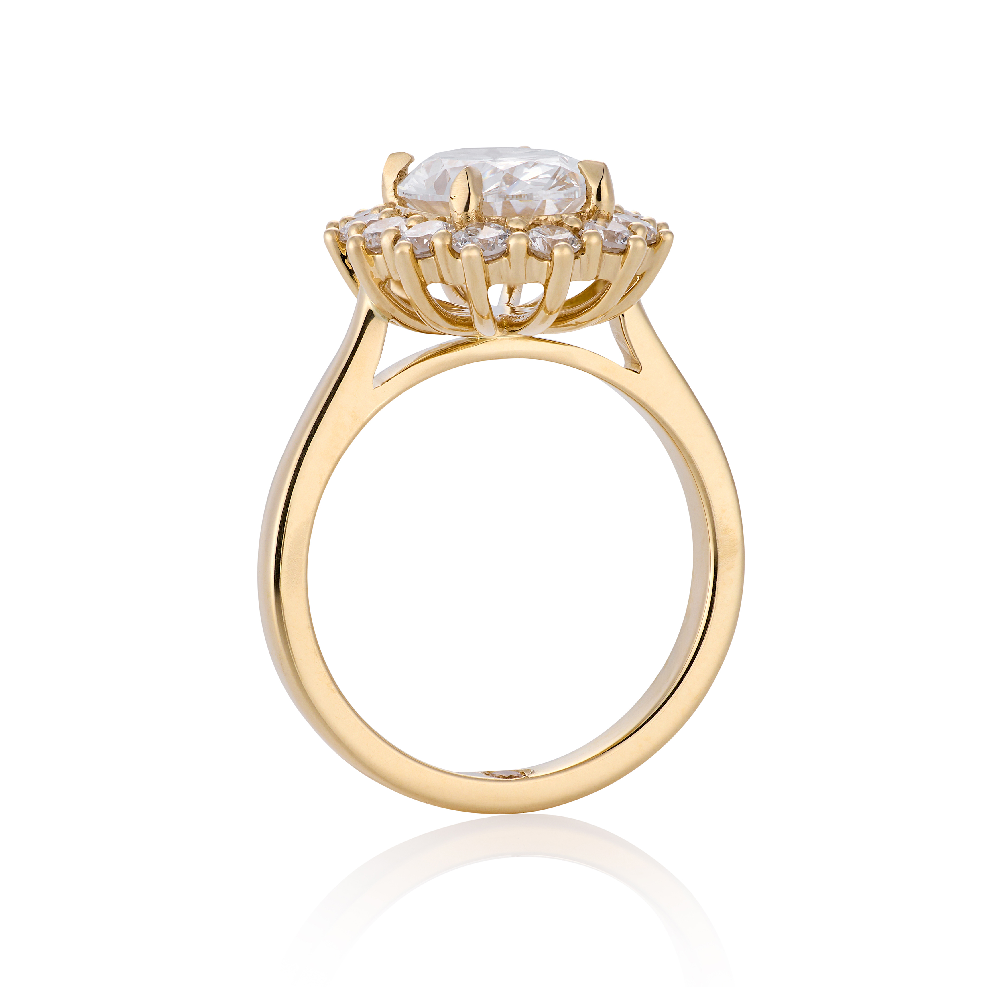 Oval diamond with star halo, standing vertical
