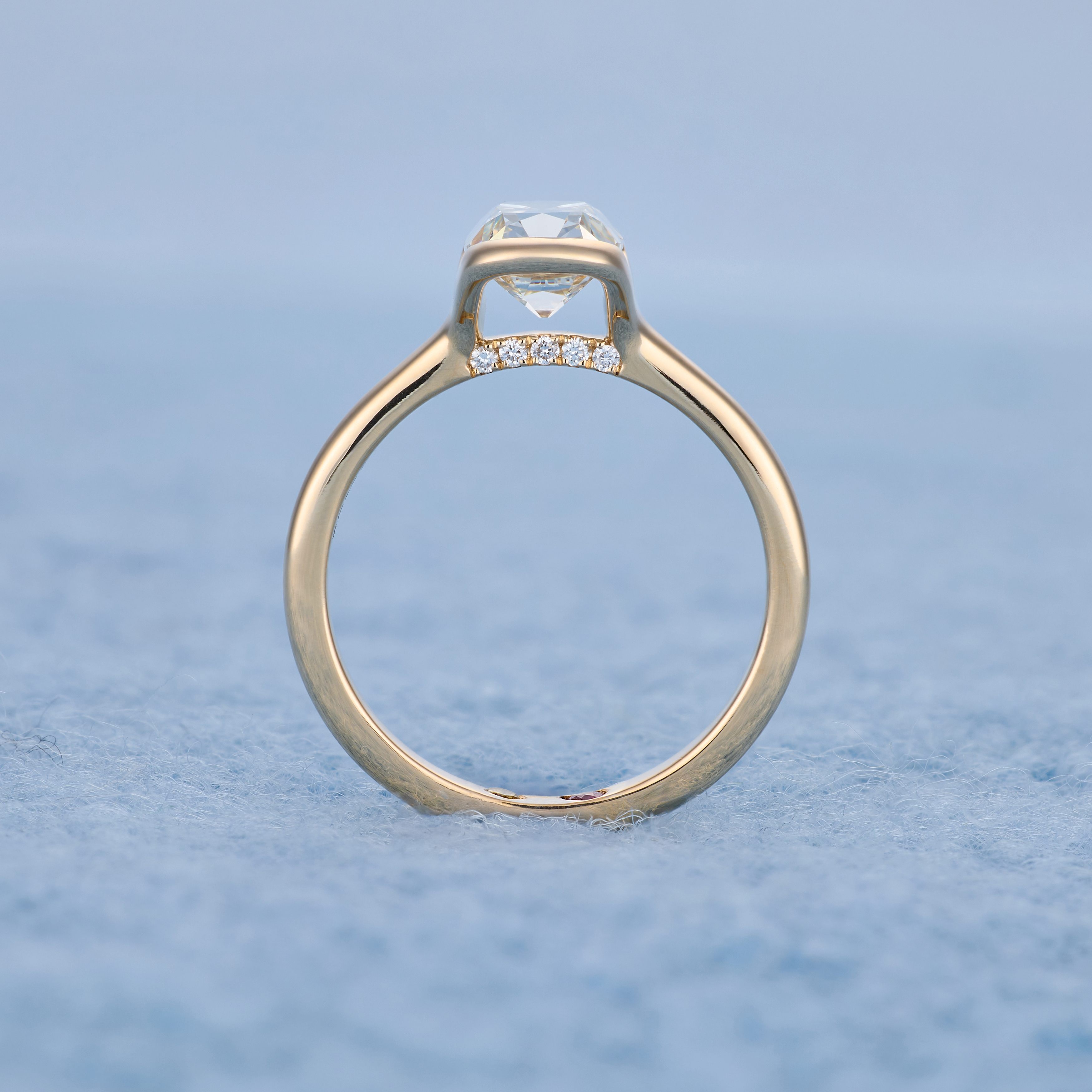 Old mine half bezel with pave bridge, detail