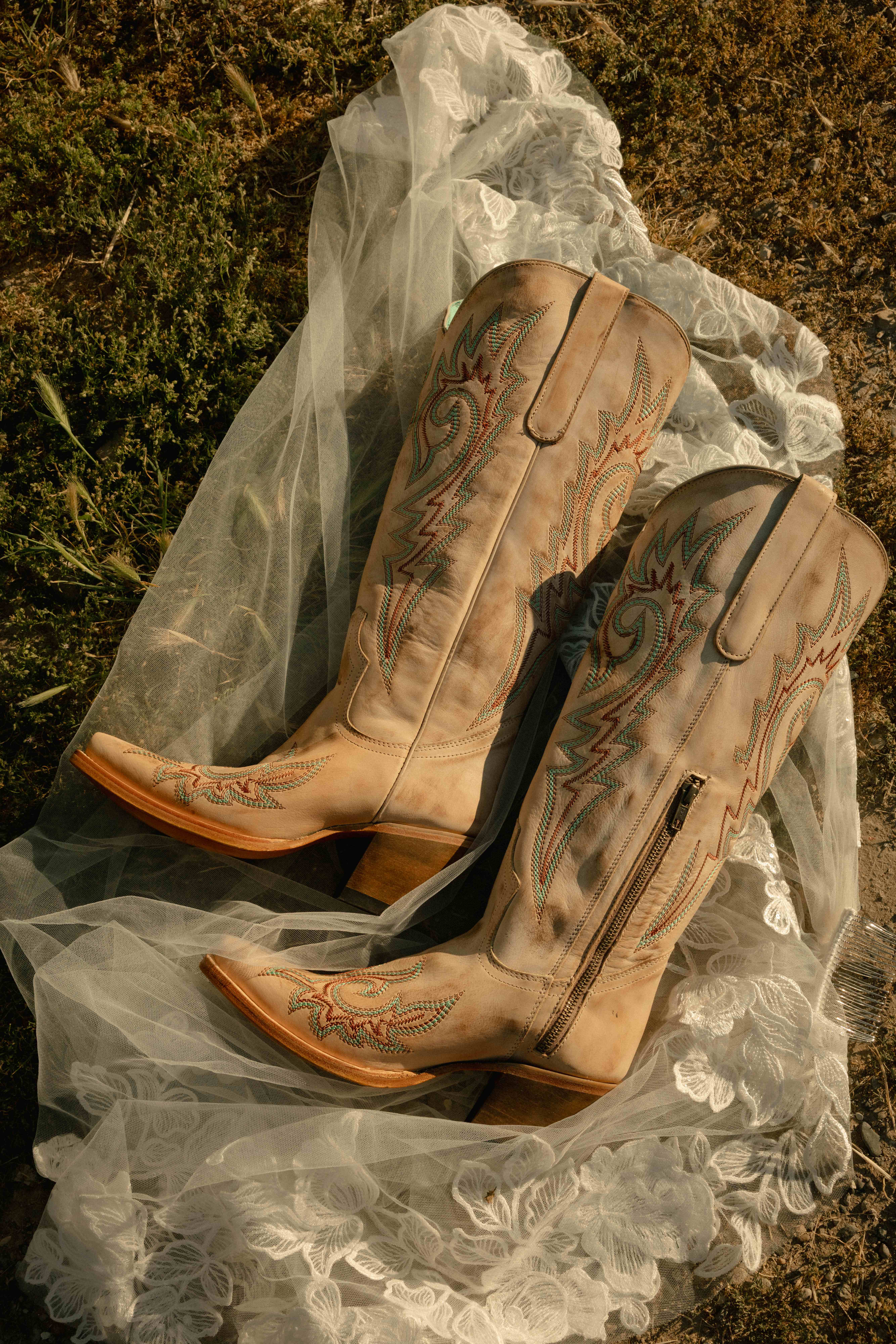 Cowboy boots on lace veil - top down