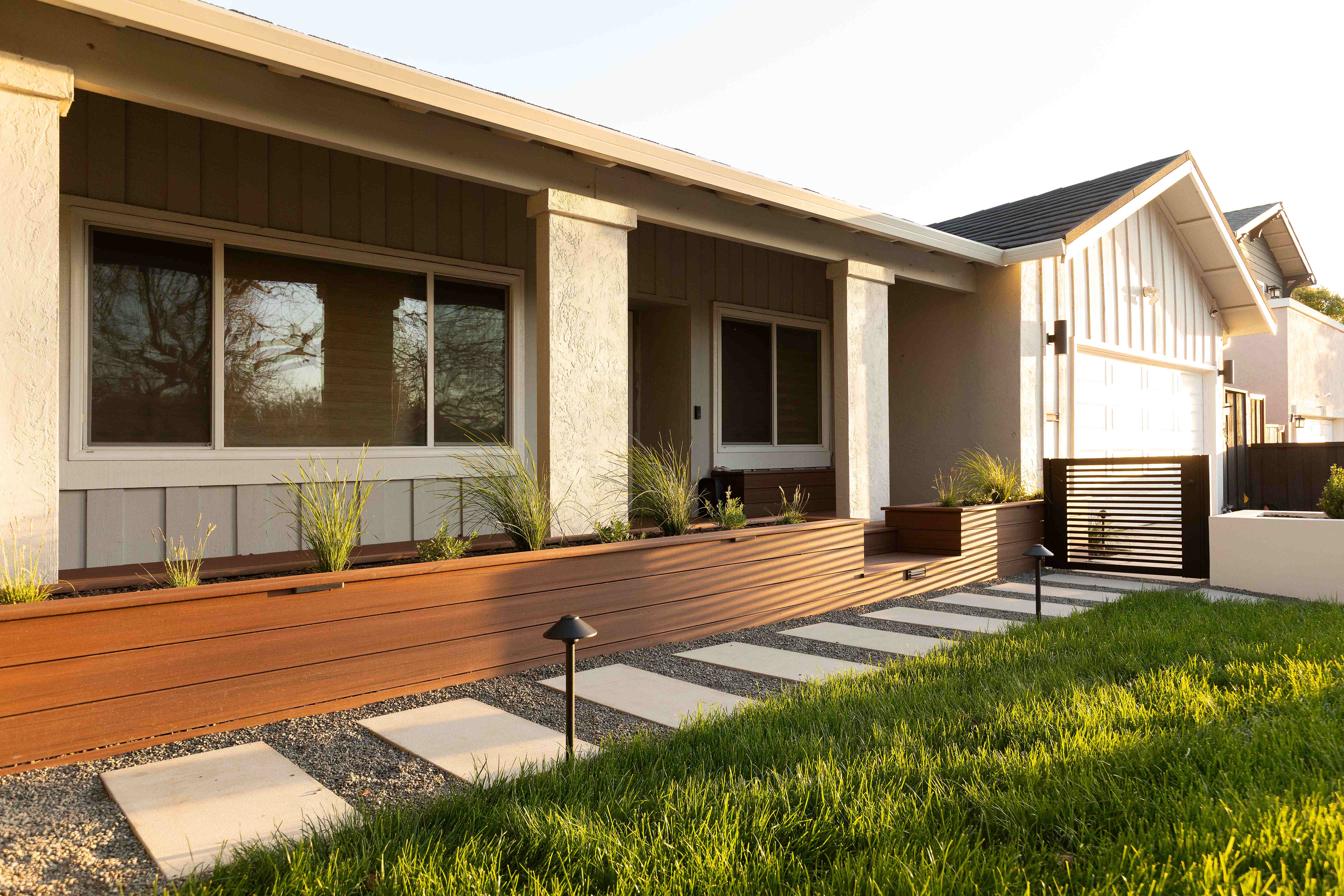 Modern California home with ornamental grasses and stepping stones