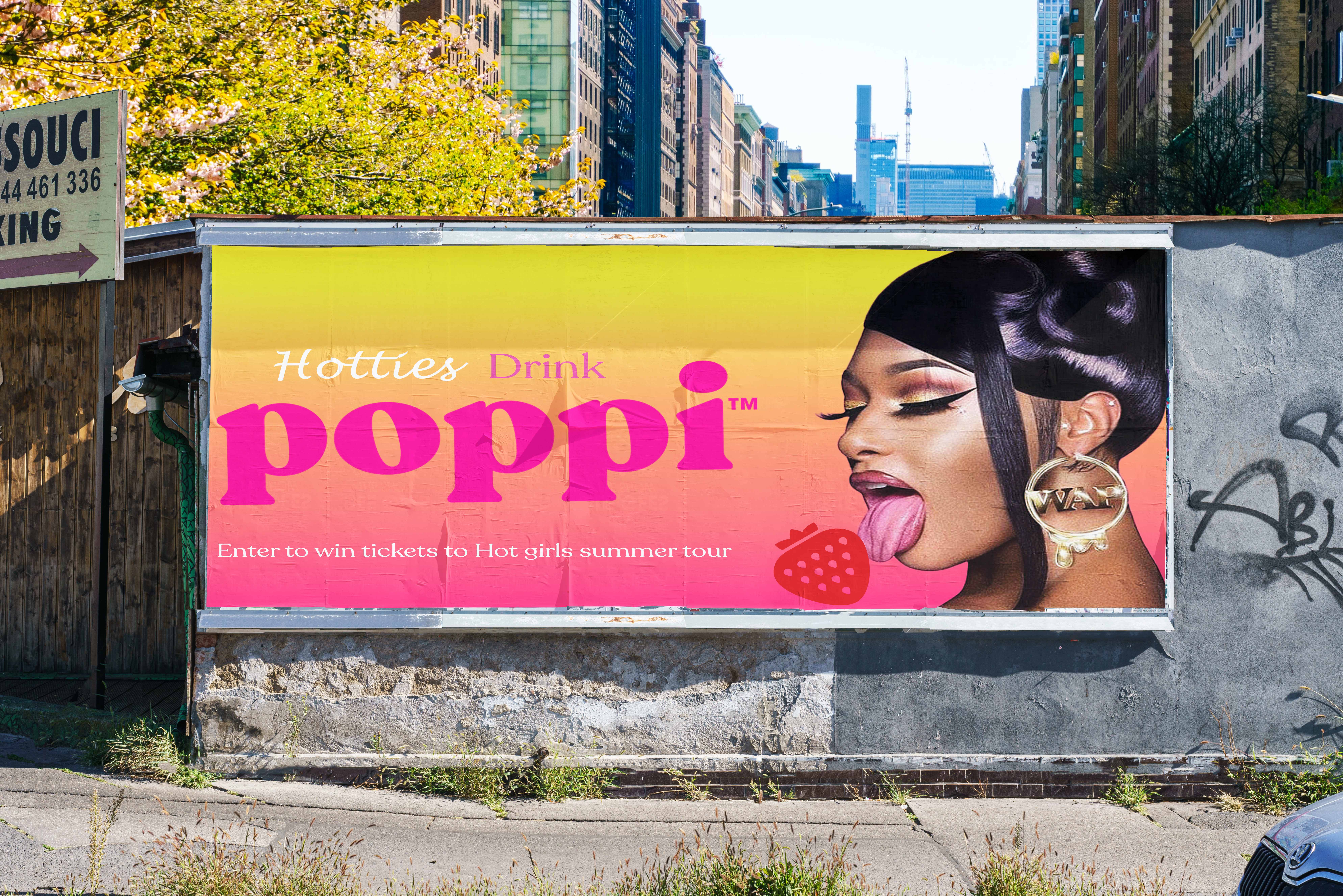 Poppi billboard mockup in urban setting — Hotties Drink Poppi featuring Megan Thee Stallion
