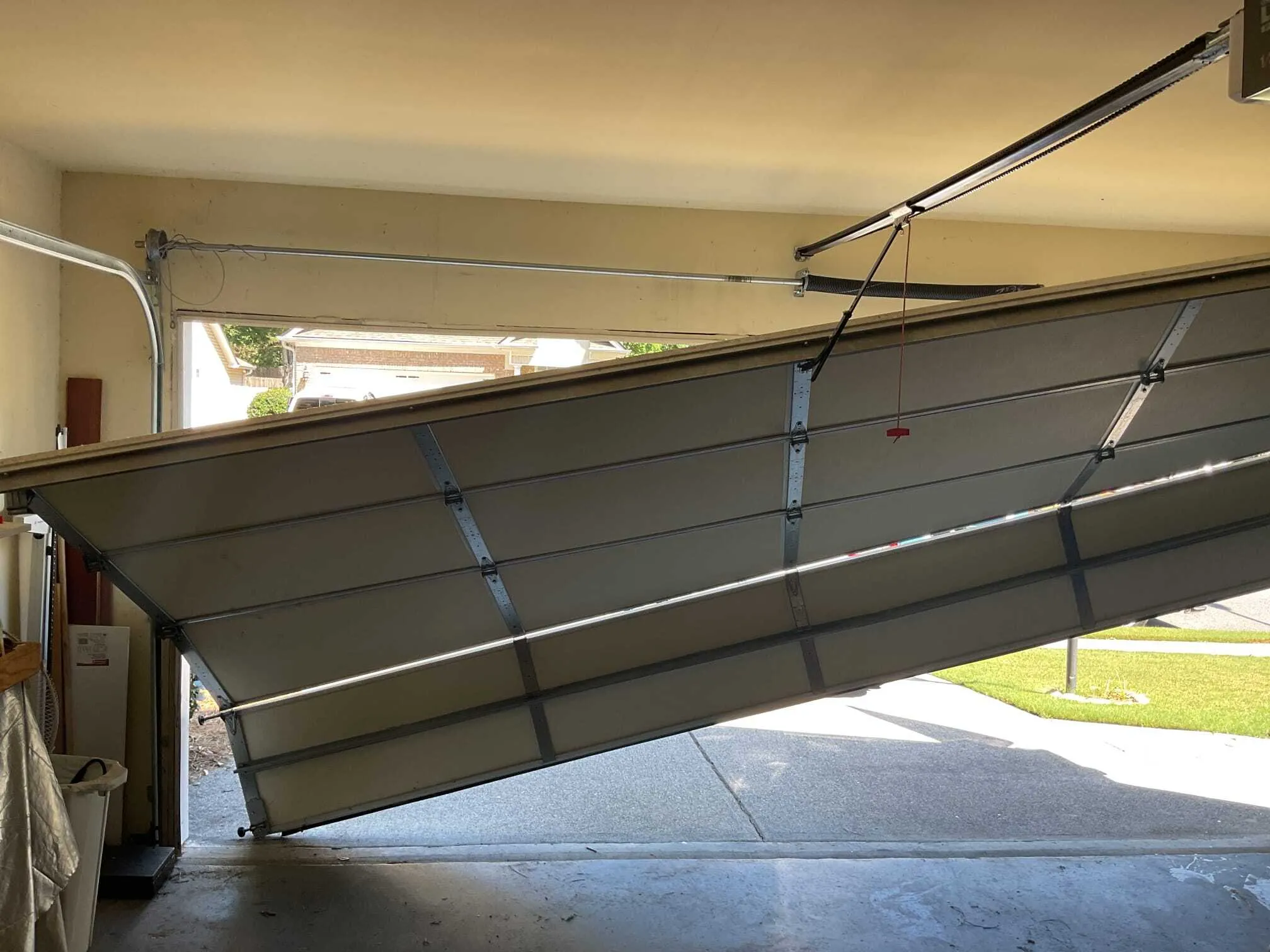 Serenity Garage Doors technician completing garage door off-track repair