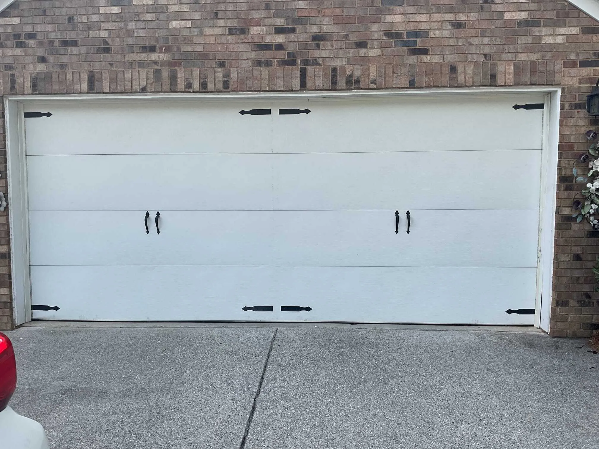 Completed garage door off-track repair on a North Atlanta home