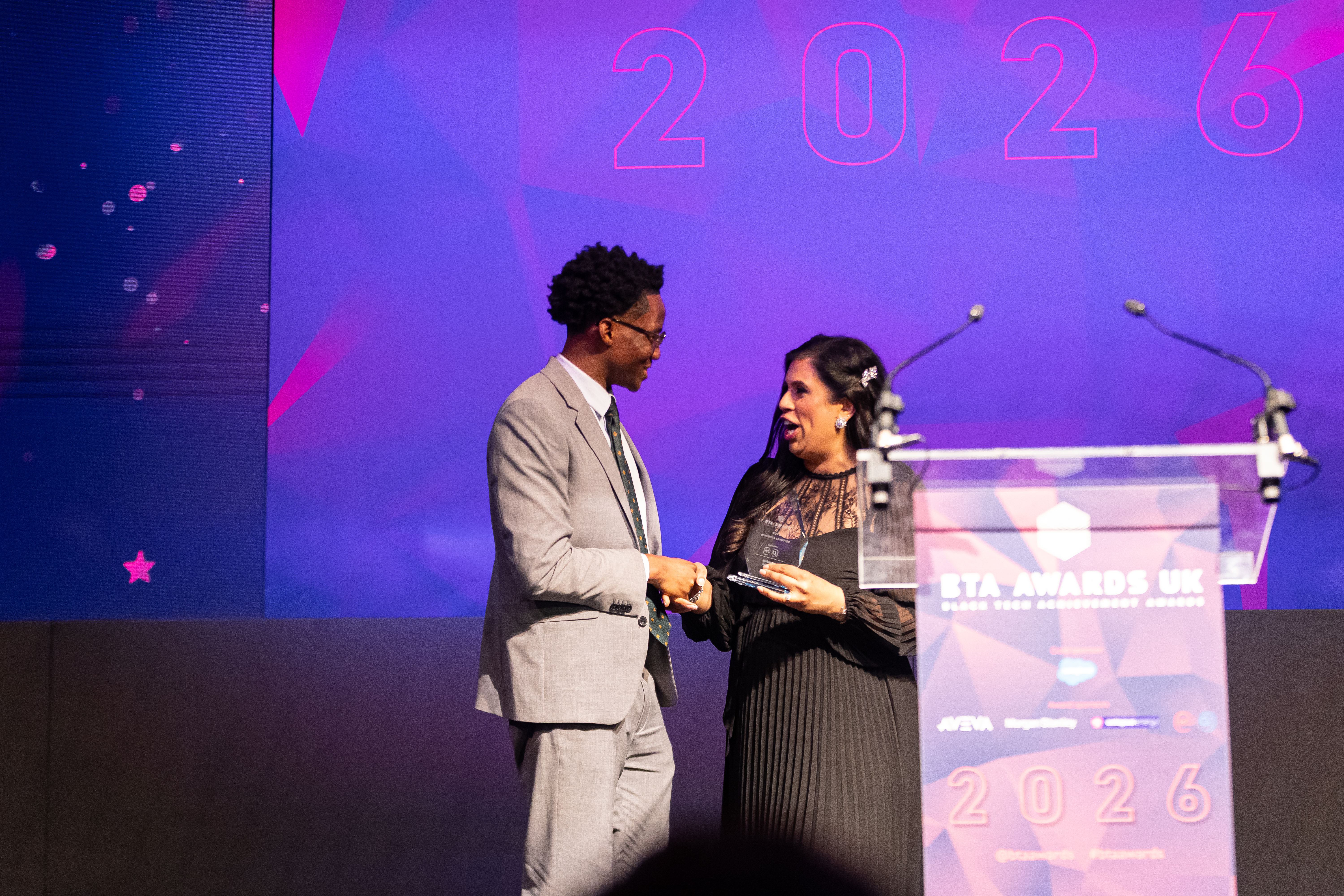 Iyioluwa Adesan receiving the Diversity Champion award