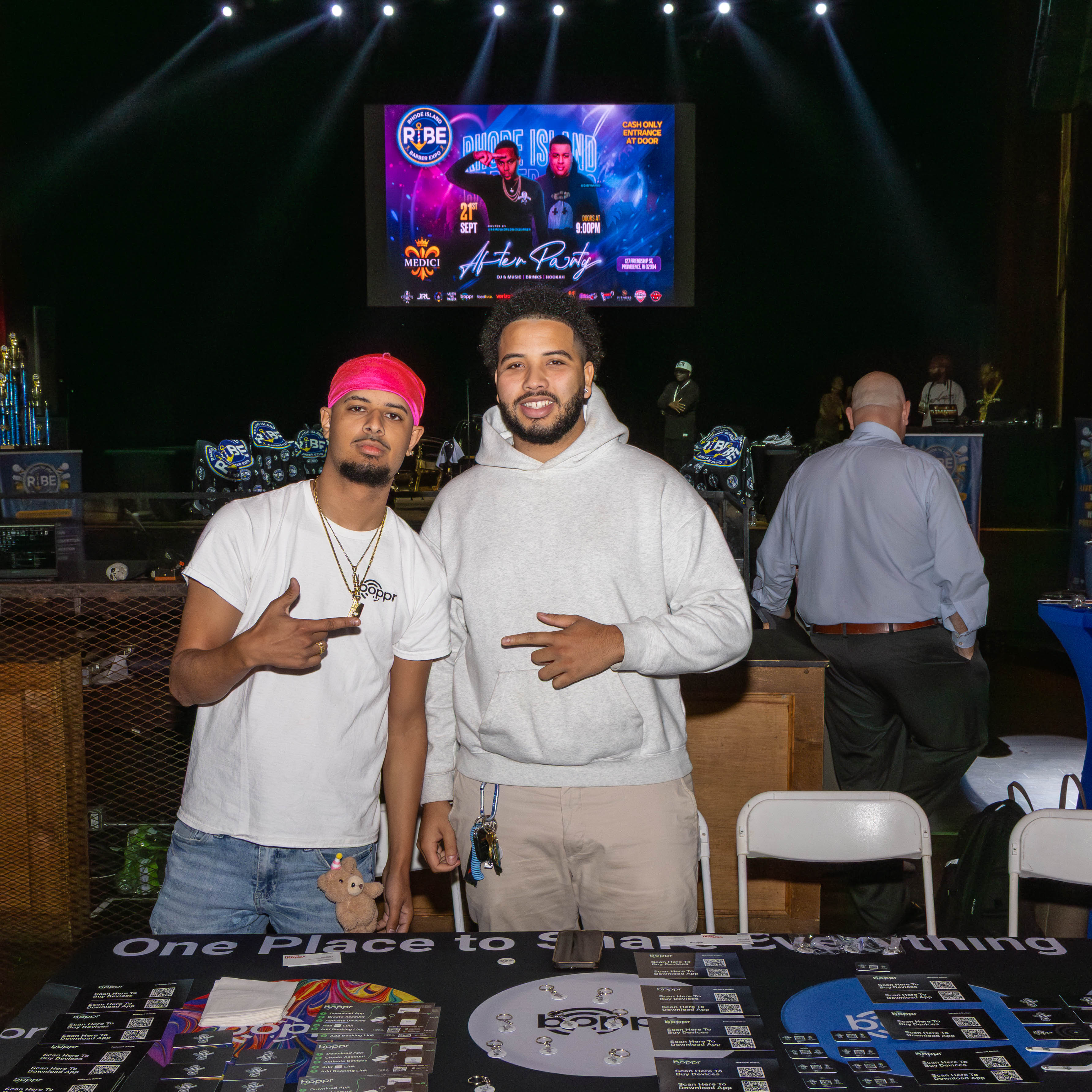 Vendors posing at their booth at Rhode Island Barber Expo