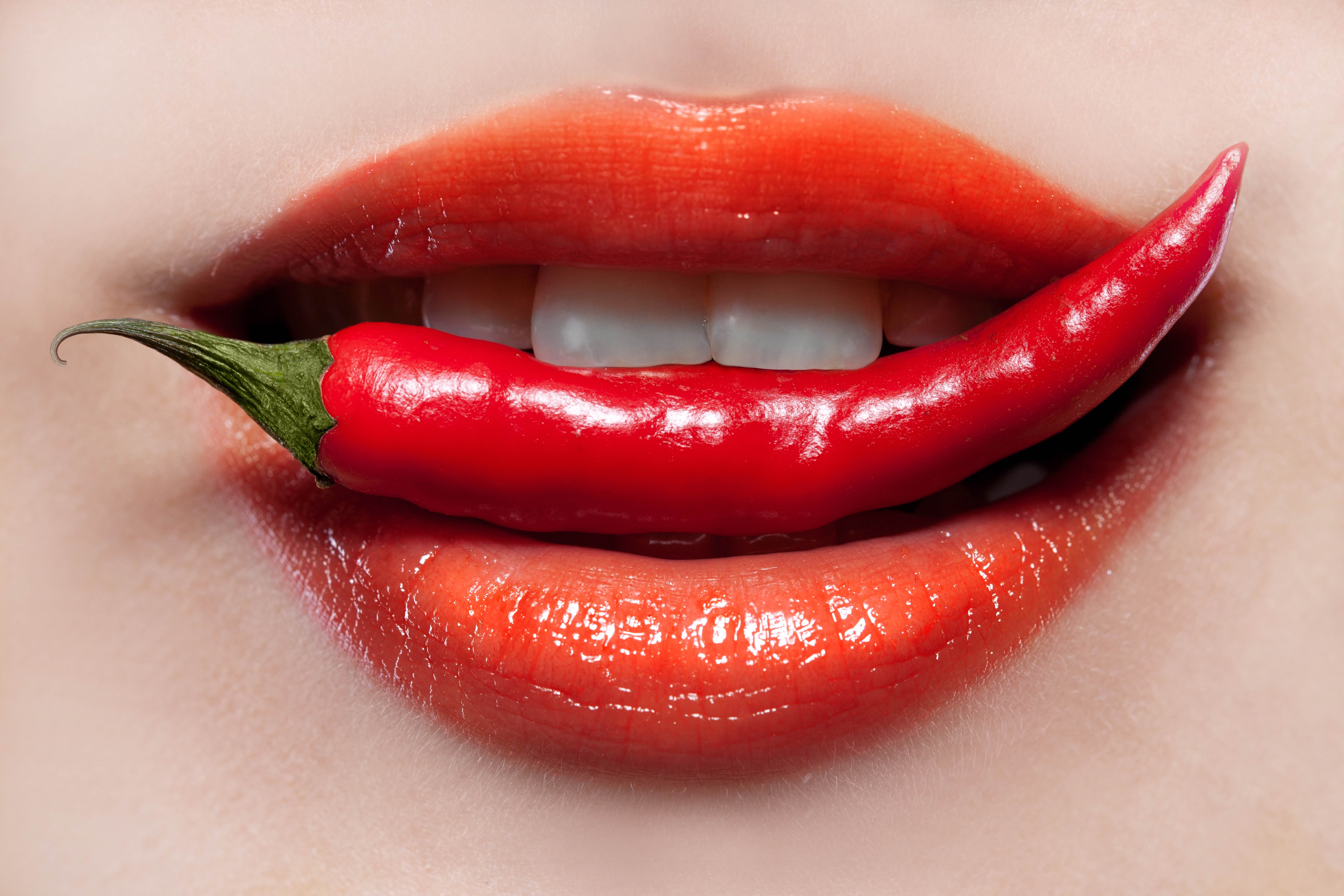 Abstract macro composition of vivid red peppers