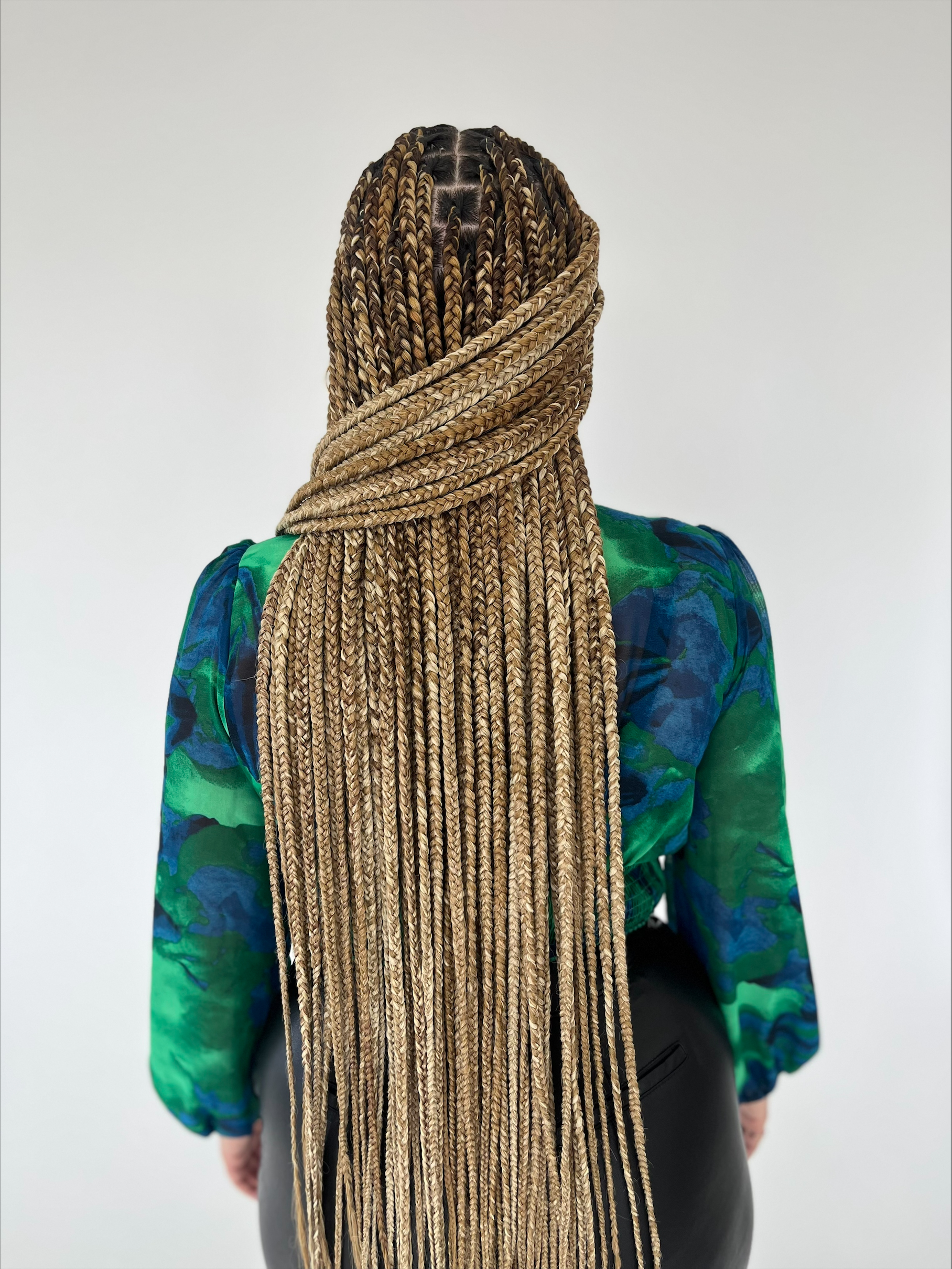 Long honey-blonde knotless braids